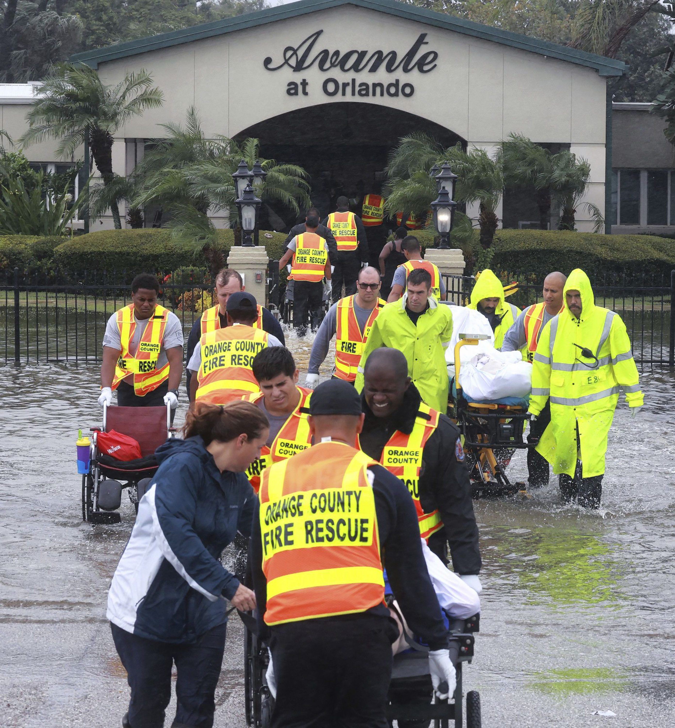 A resident of Avante At Orlando, a nursing home on Semoran Boulevard, is evacuated from flood waters in the wake of Hurricane Ian on September 29, 2022. | Source: Getty Images