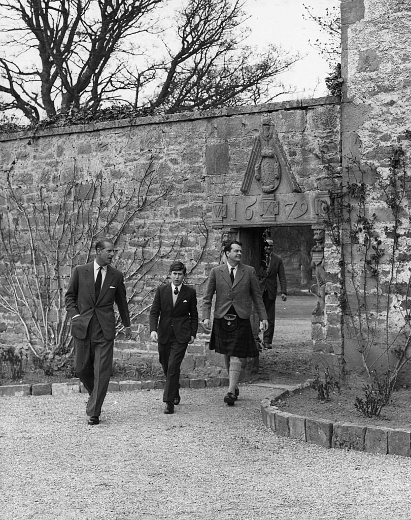 Prince Charles arrives for his first term at Gordonstoun school in Moray, Scotland, accompanied by his father Prince Philip and Captain Iain Tennant on May 1, 1962: | Source: William Vanderson/Fox Photos/Getty Images