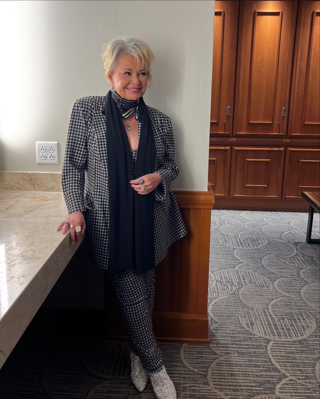 Roseanne Barr looking magnificent in a houndstooth suit, from an Instagram post, dated September 30, 2024 | Source: Instagram/officialroseannebarr/