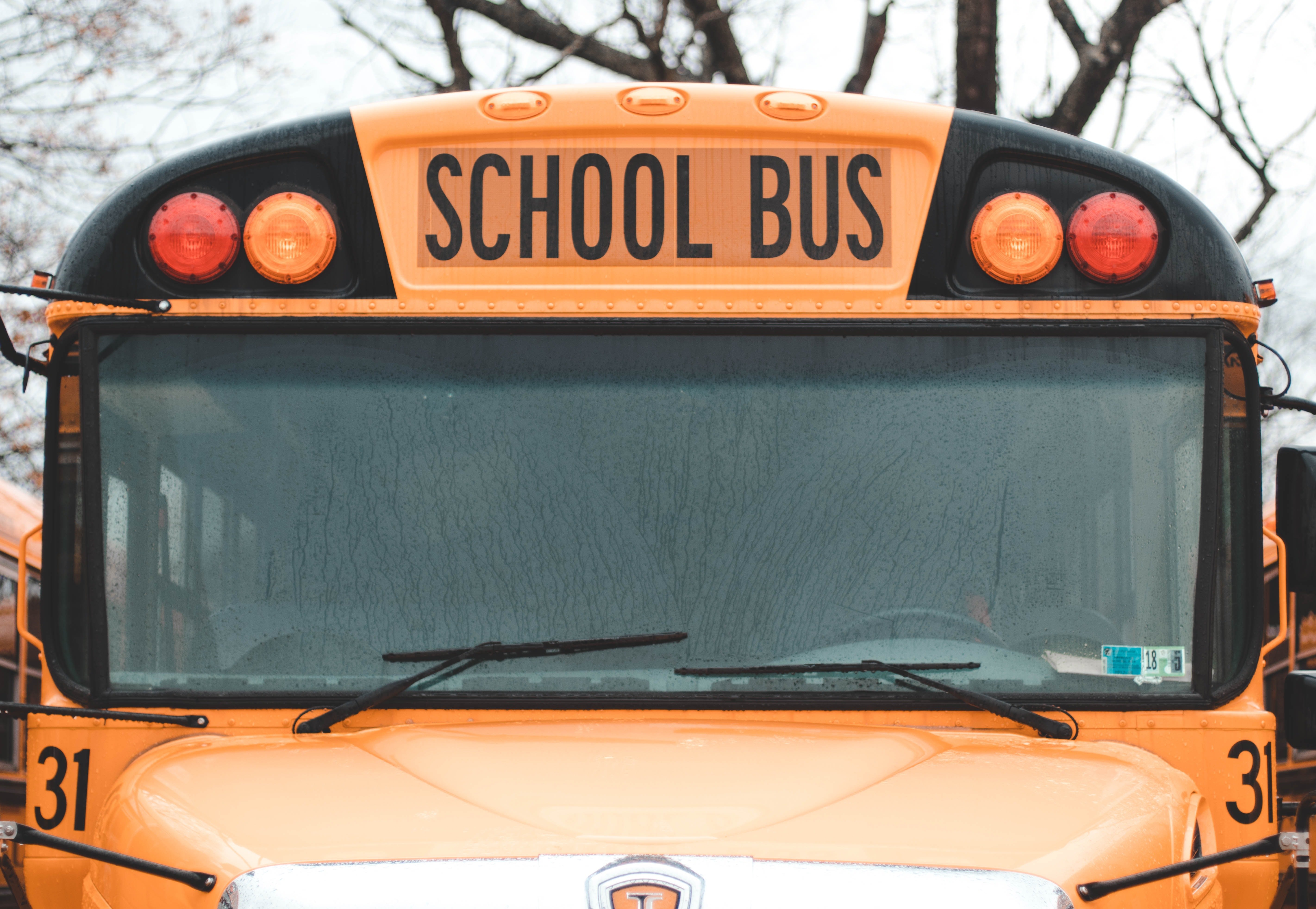 The front of a parked yellow school bus | Source: Unsplash