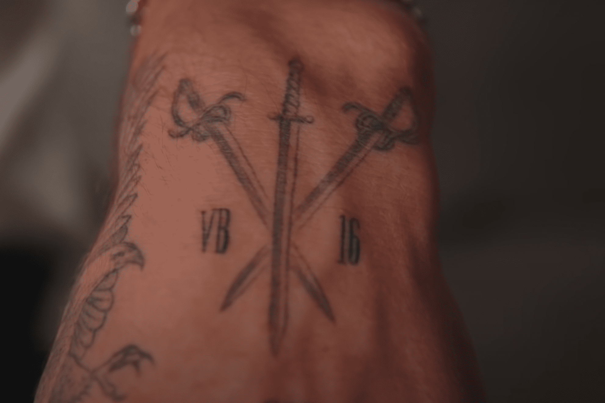 Vinnie Hacker's swords tattoo in honor of his family | Source: YouTube/ Inked