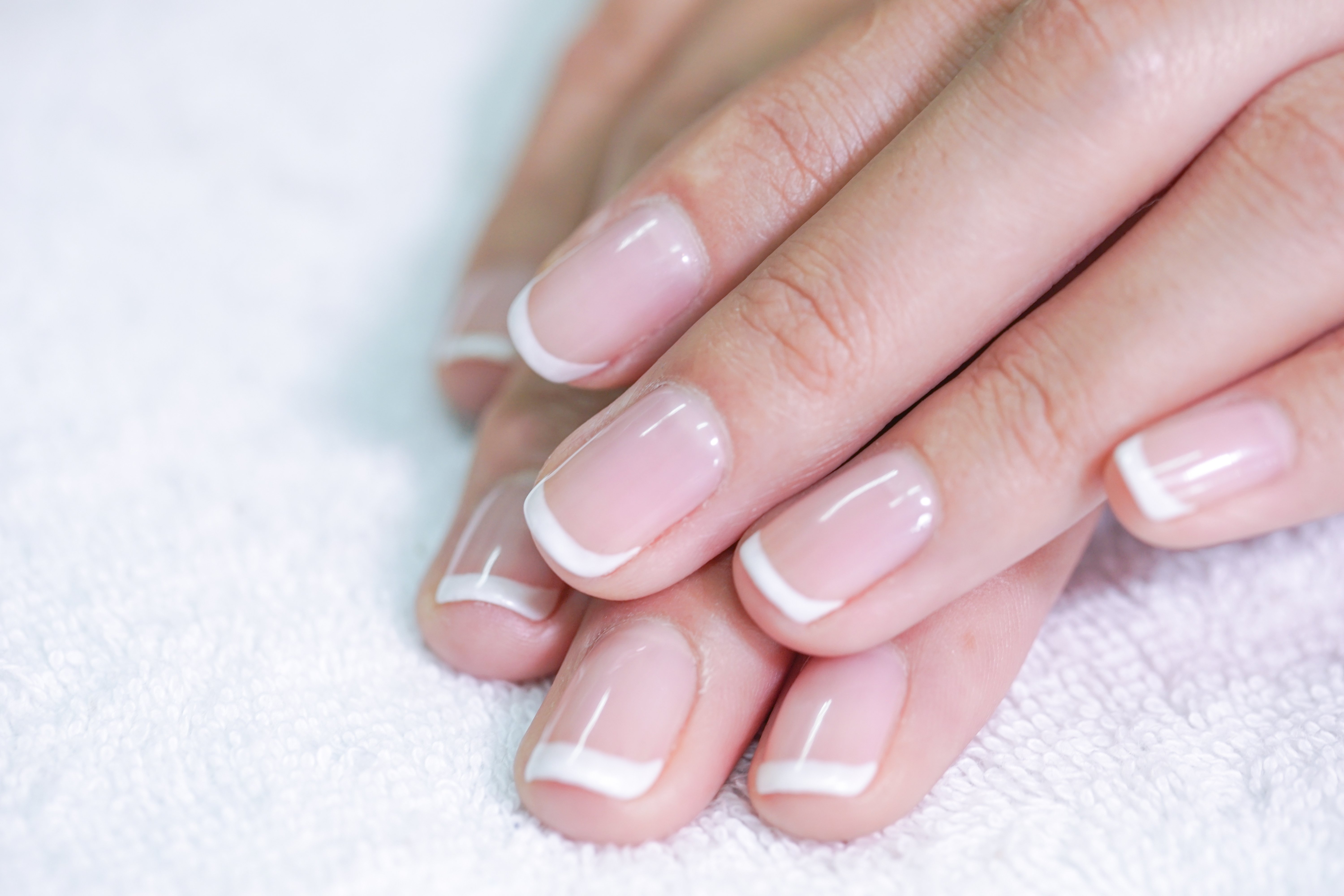 Classic French manicure nails | Source: Getty Images