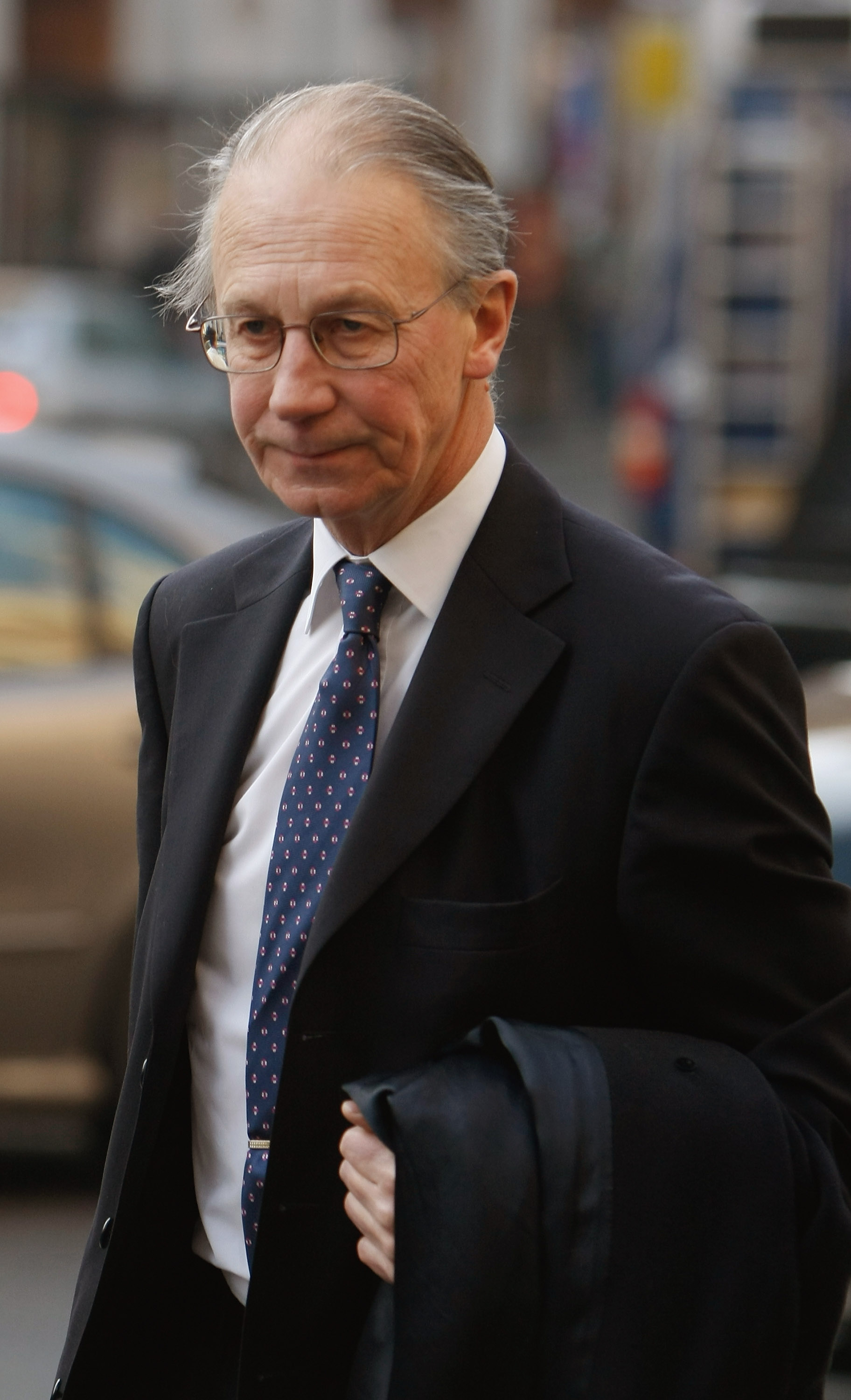 Lord Robert Fellows arrives to the High Court in London, England on February 12, 2008 | Source: Getty Images