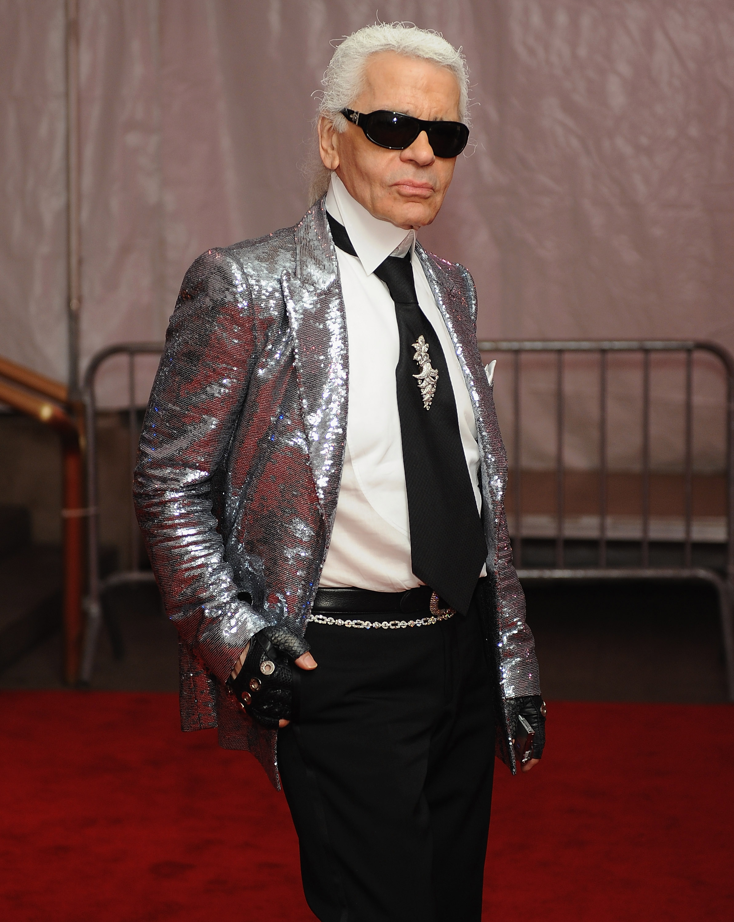 Karl Lagerfeld departs the Metropolitan Museum of Art Costume Institute Gala, Superheroes: Fashion and Fantasy, in New York City, on May 5, 2008. | Source: Getty Images