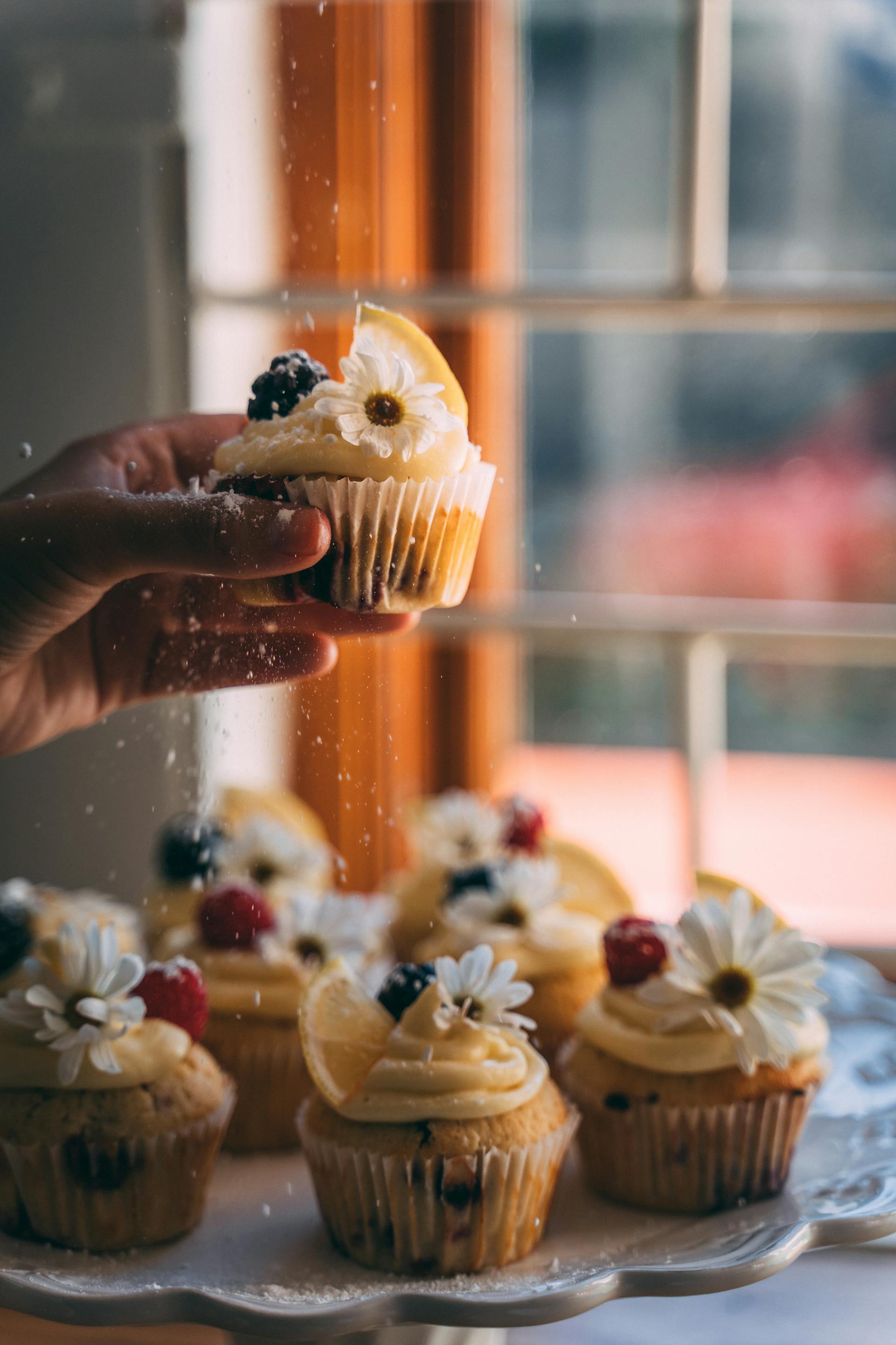A person holding a cupcake | Source: Pexels
