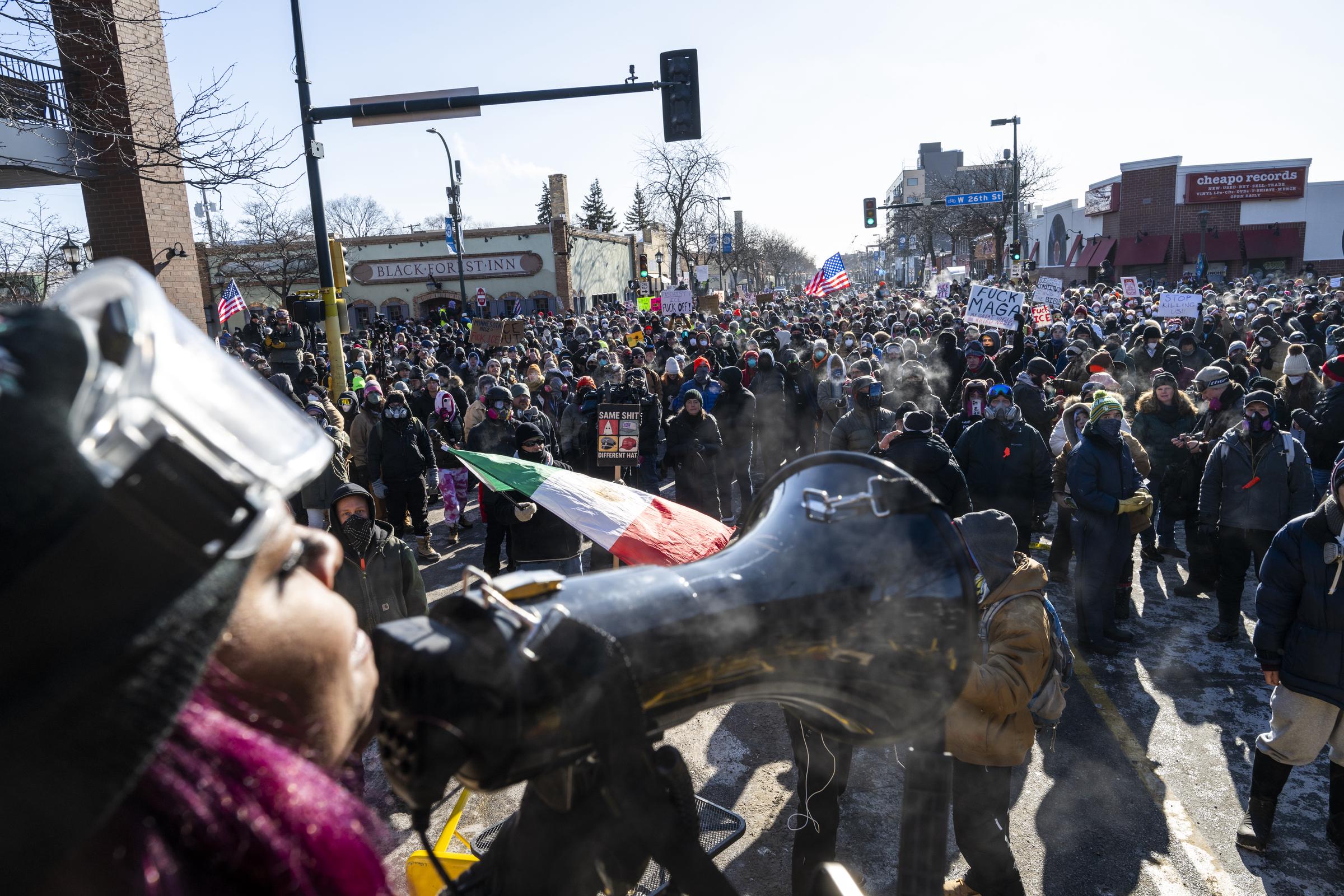 People gather at the intersection of 26th Street and Nicollet Avenue after a fatal shooting by federal agents on January 24, 2026 | Source: Getty Images