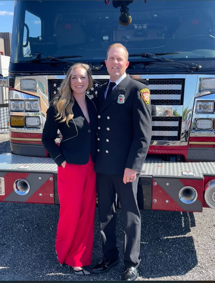 Spencer and Katrina Long pose together in front of a Provo Fire & Rescue engine. The couple were remembered by family as devoted parents whose lives centered on serving others and raising their four children. | Source: Facebook/katrina.g.long