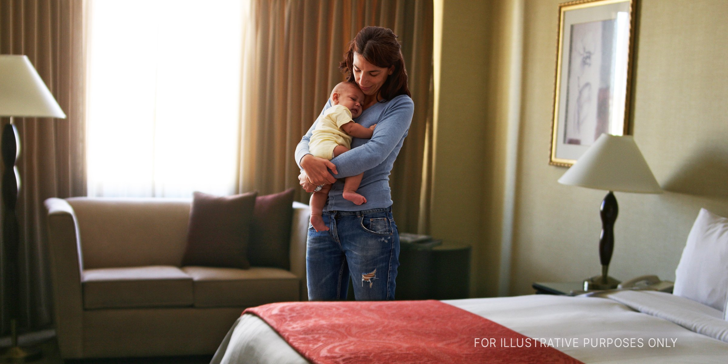 Flickr / quinn.anya (CC BY-SA 2.0) Shutterstock | Woman in a bedroom holding a baby