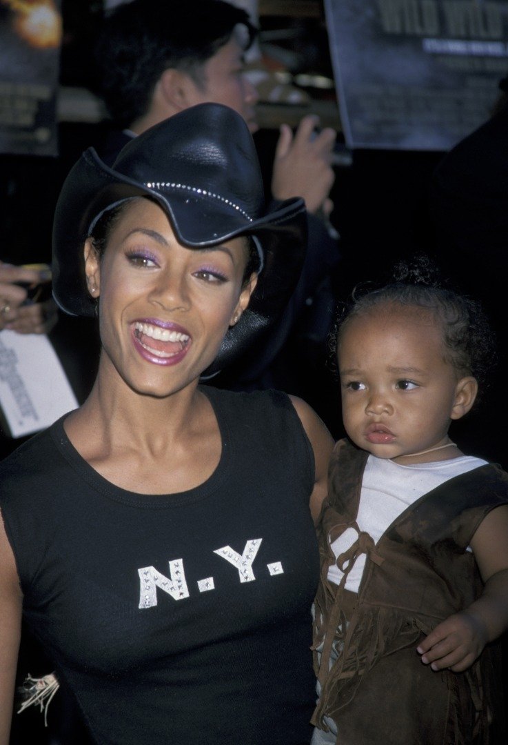 Jada Pinkett Smith carrying her son Jaden. | Source: Getty Images