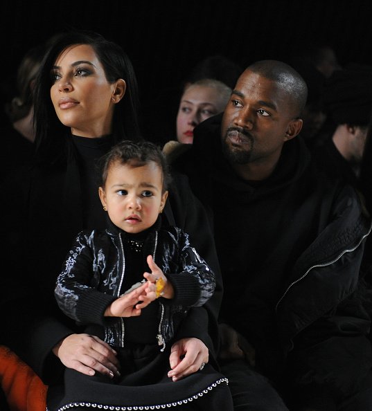 Kim Kardashian, North West, and Kanye West at Pier 94 on February 14, 2015 in New York City | Photo: Getty Images