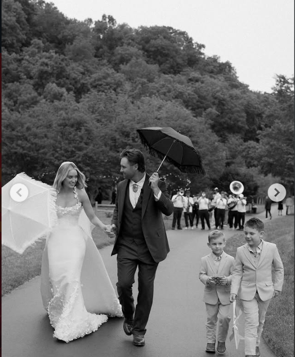 The newlyweds walking alongside some of their pageboys | Source: Instagram/laineywilson