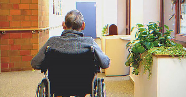 An old man in a wheelchair | Source: Shutterstock