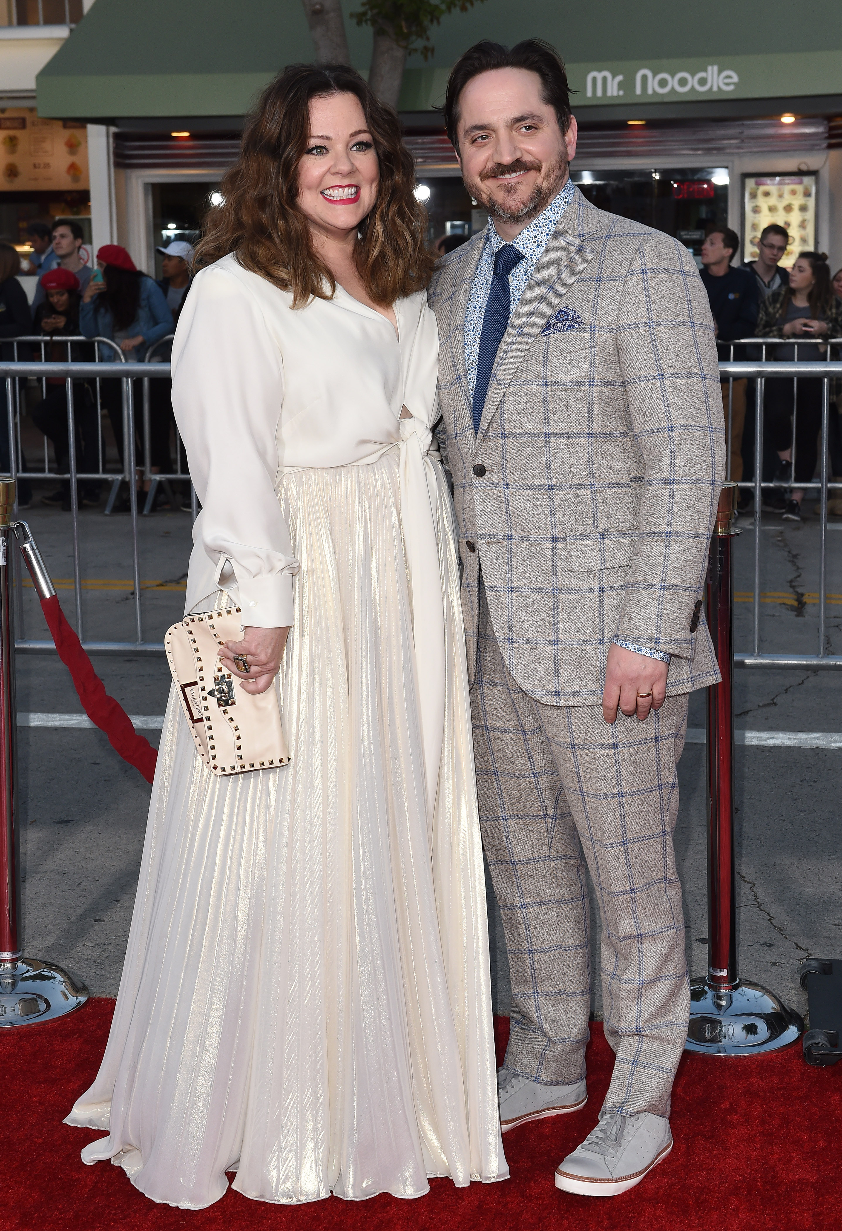 Actress Melissa McCarthy and husband Ben Falcone arrive at the premiere of USA Pictures' 'The Boss' at Regency Village Theatre on March 28, 2016, in Westwood, California. | Source: Getty Images