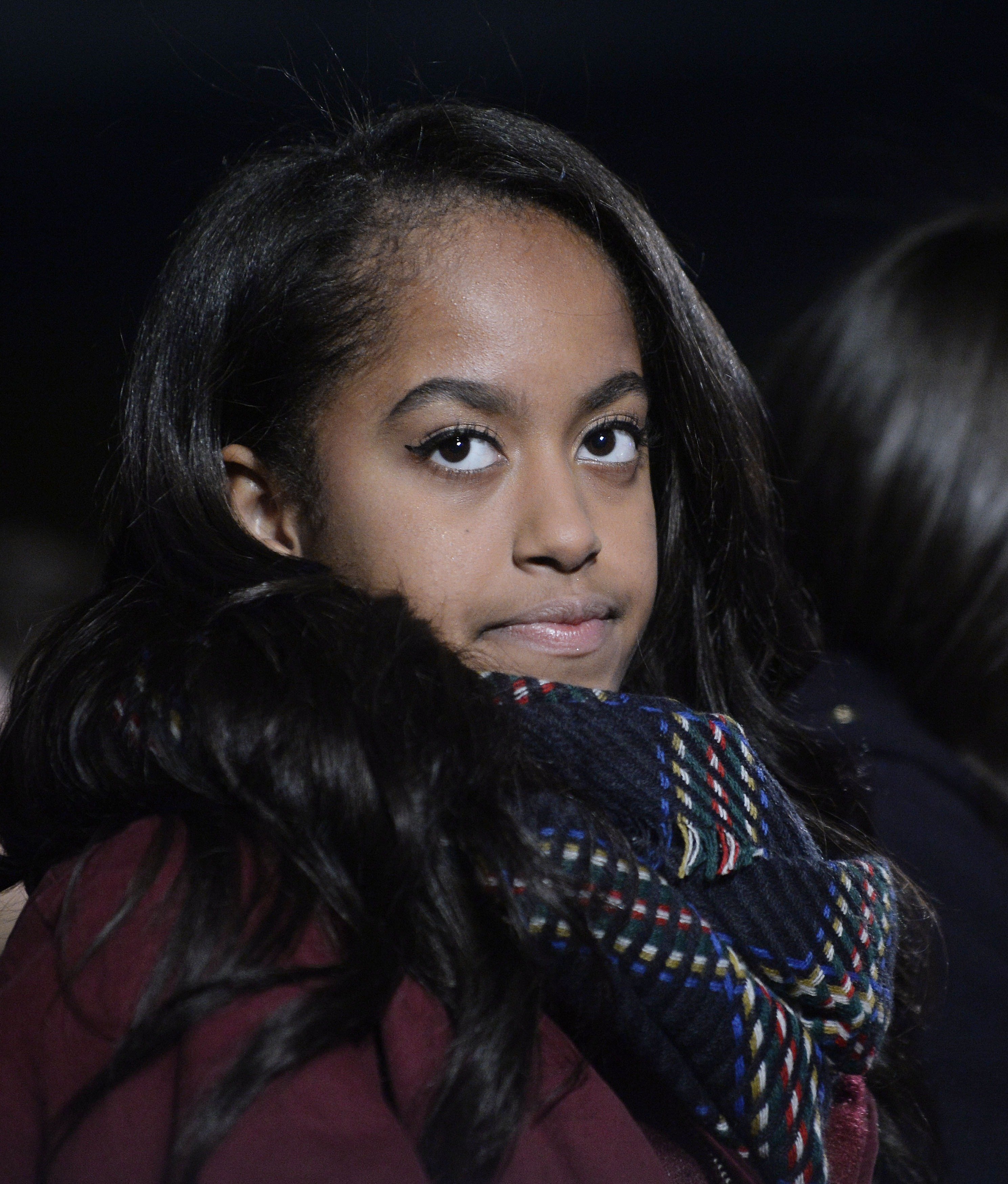  Malia Obama attends the national Christmas tree lighting ceremony in the White House. December, 2015. | Photo: GettyImages/Global Images of Ukraine