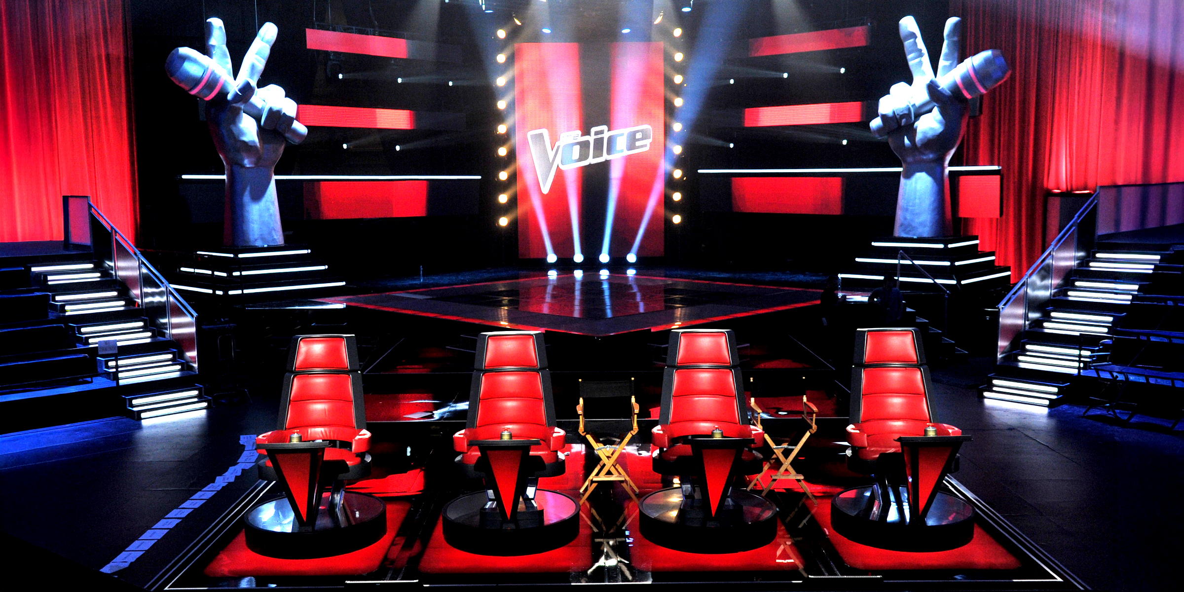 Inside 'The Voice': Iconic Stage, Swivel Chairs, and Bold Red Spotlight Glow | Source: Getty Images