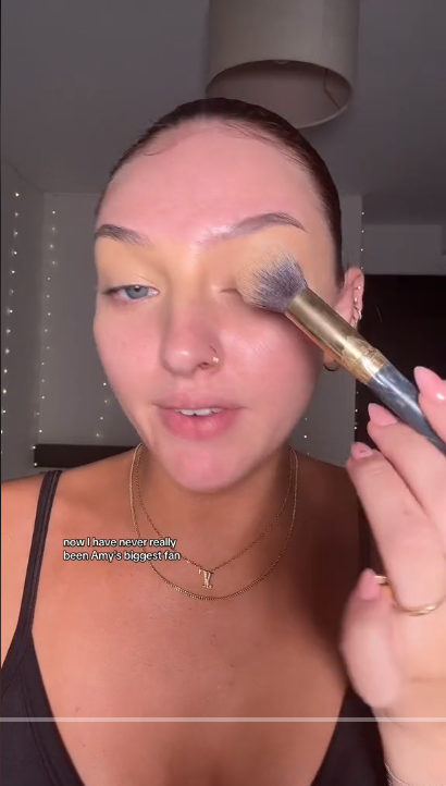 Tatty Lomas applying her makeup and sharing her story | Source: TikTok/@tattylomas