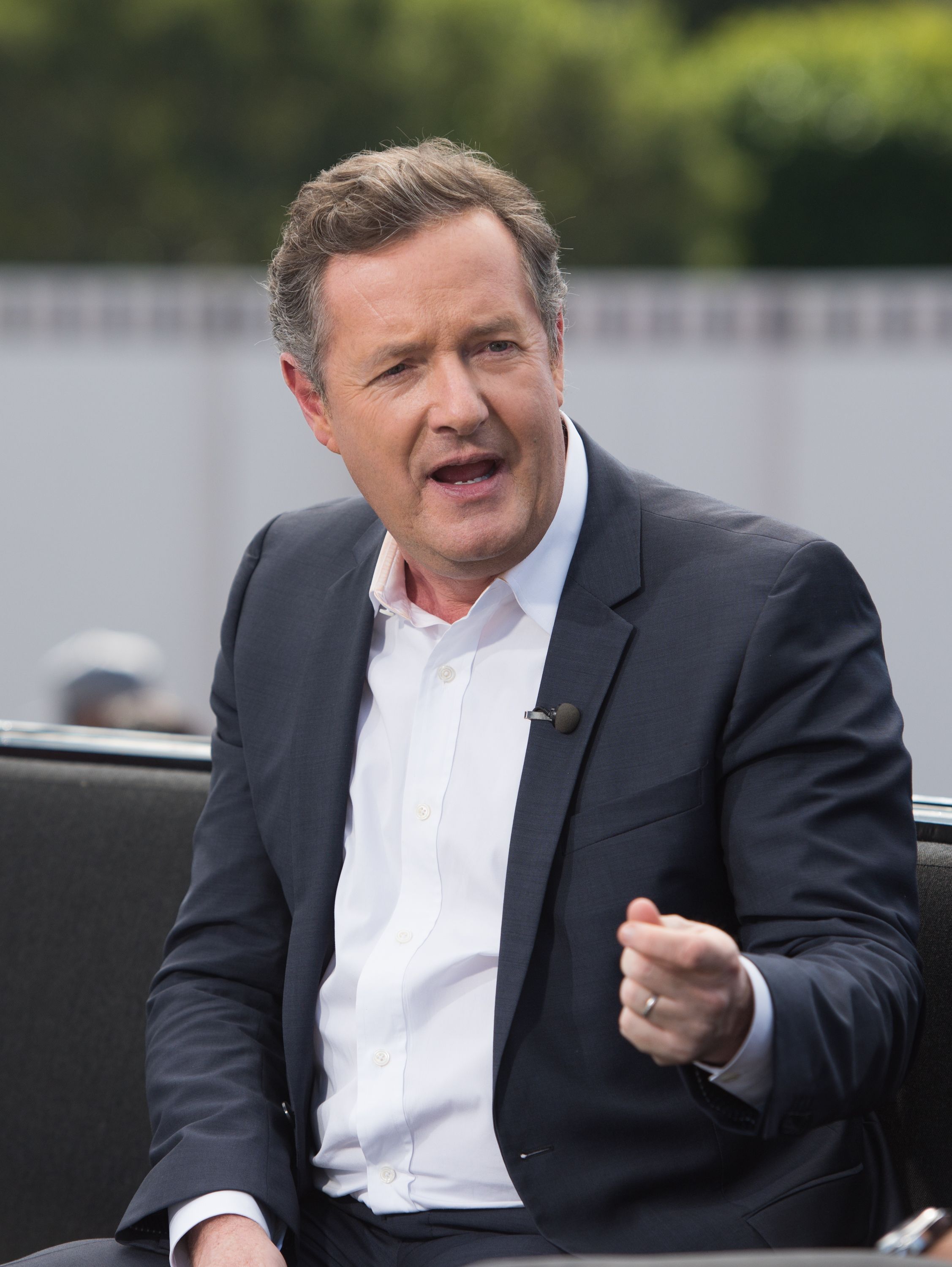 Piers Morgan visits "Extra" at Universal Studios Hollywood on February 11, 2016, in Universal City, California | Photo:Getty Images