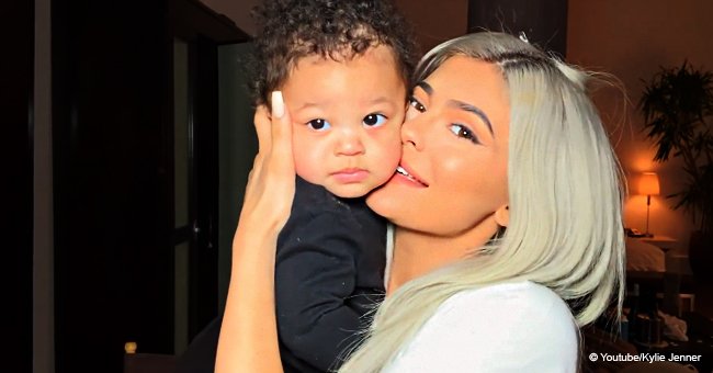 Kylie Jenner pauses makeup tutorial to cuddle & kiss baby Stormi with sparse hair in sweet video 