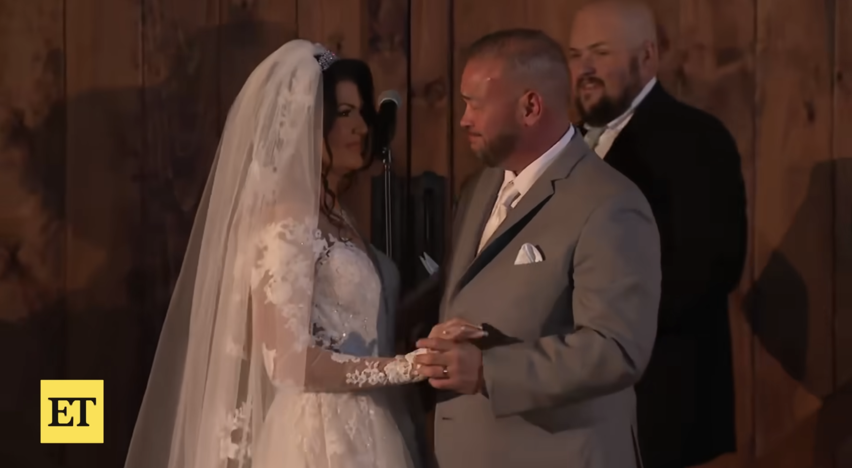 Stephanie Lebo and Jon Gosselin are seen holding hands on their wedding day, dated November 24, 2025 | Source: YouTube/EntertainmentTonight