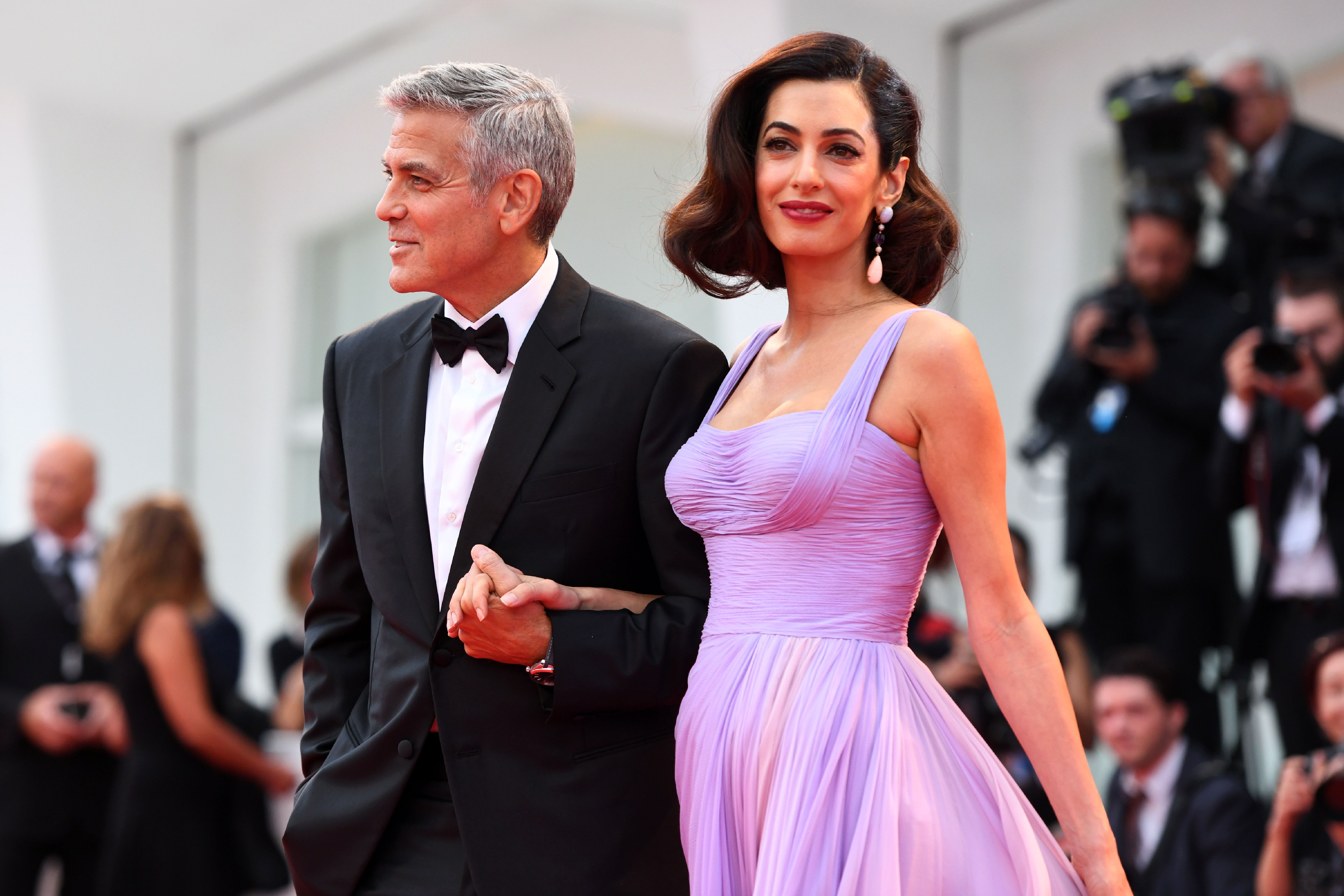 George Clooney and his wife Amal attend the premiere of the movie "Suburbicon" presented out of competition at the 74th Venice Film Festival on September 2, 2017 at Venice Lido | Source: Getty Images 