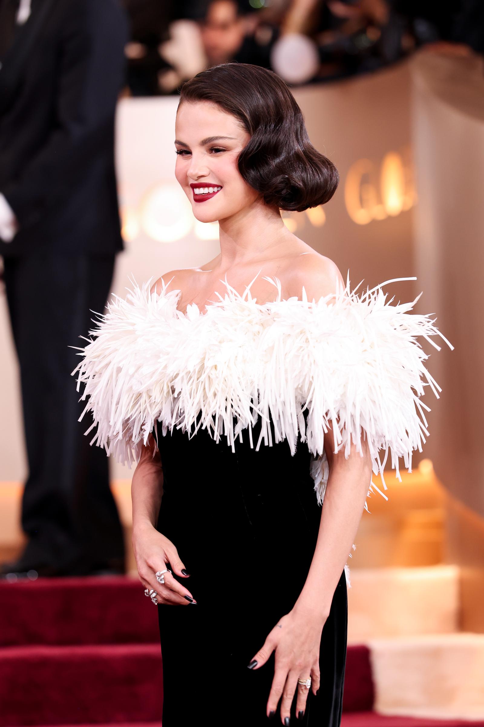Selena Gomez smiling on the 2026 Golden Globe Awards red carpet. | Source: Getty Images
