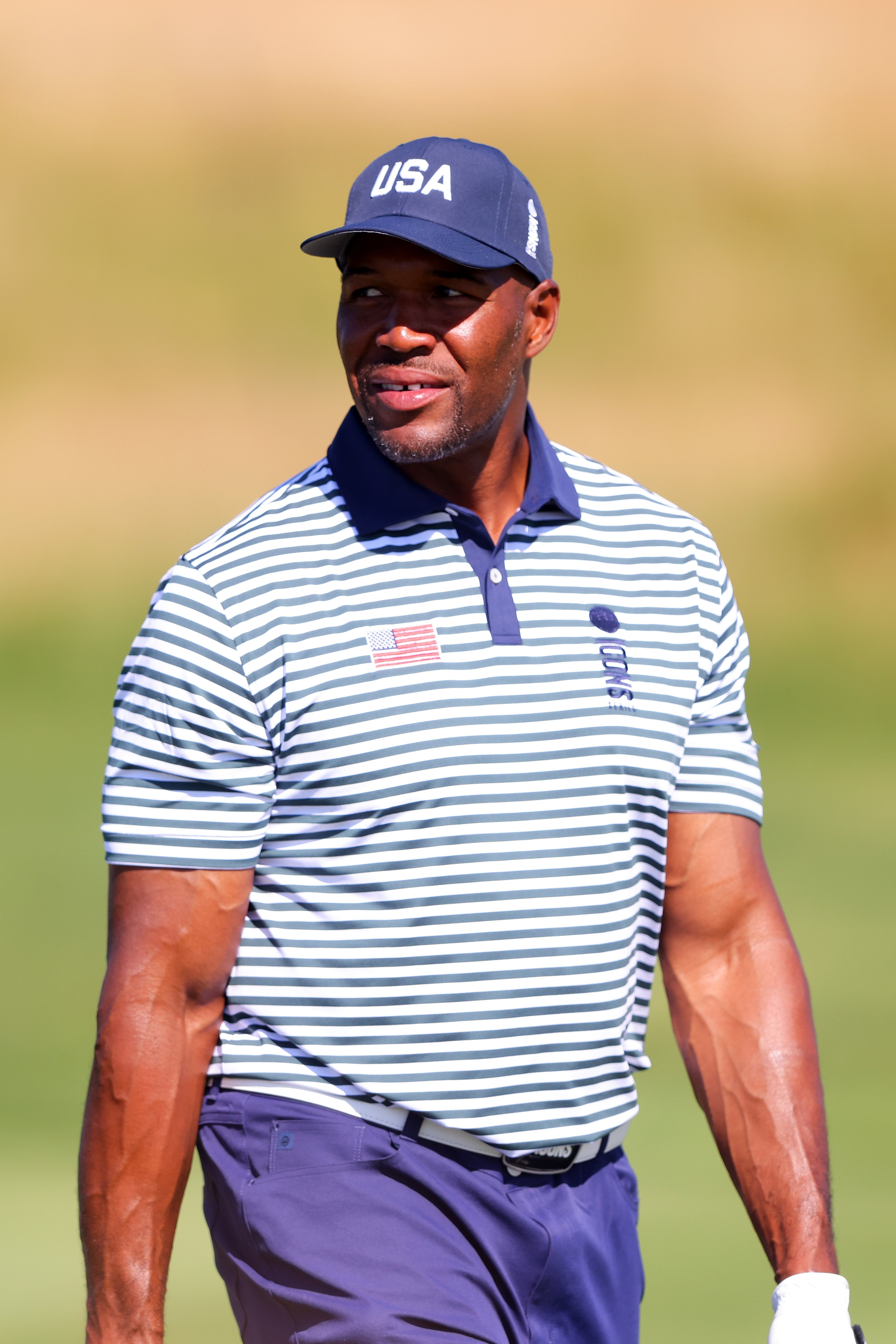 Michael Strahan walks the fairway on the 7th hole during day one of the ICON Series at Liberty National Golf Club on June 30, 2022, in Jersey City, New Jersey. | Source: Getty Images