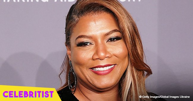 Queen Latifah steals the spotlight in tight black pants & long black robe in red carpet pic