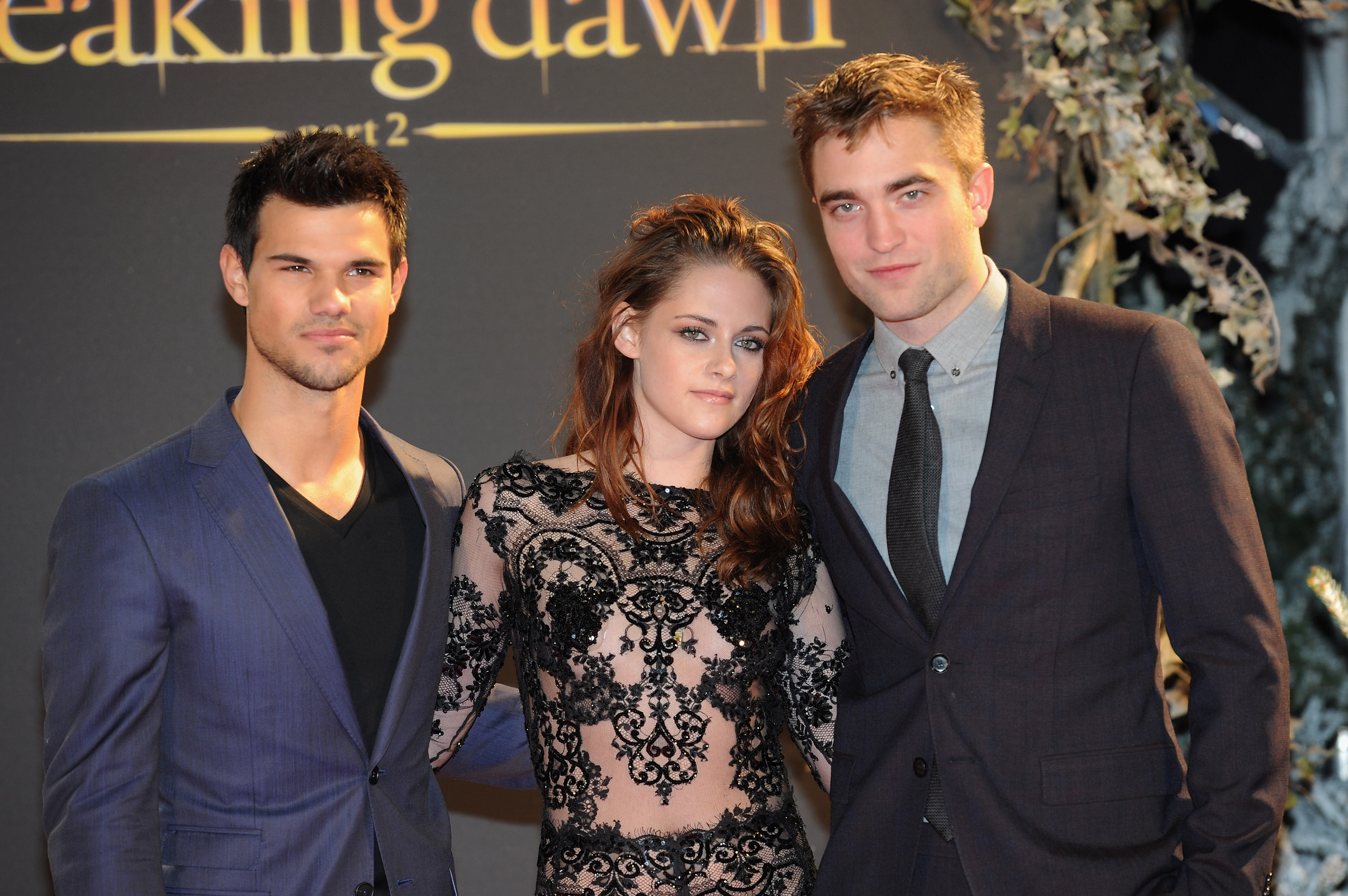 Taylor Lautner, Kristen Stewart, and Robert Pattinson in London, England on November 14, 2012 | Source: Getty Images