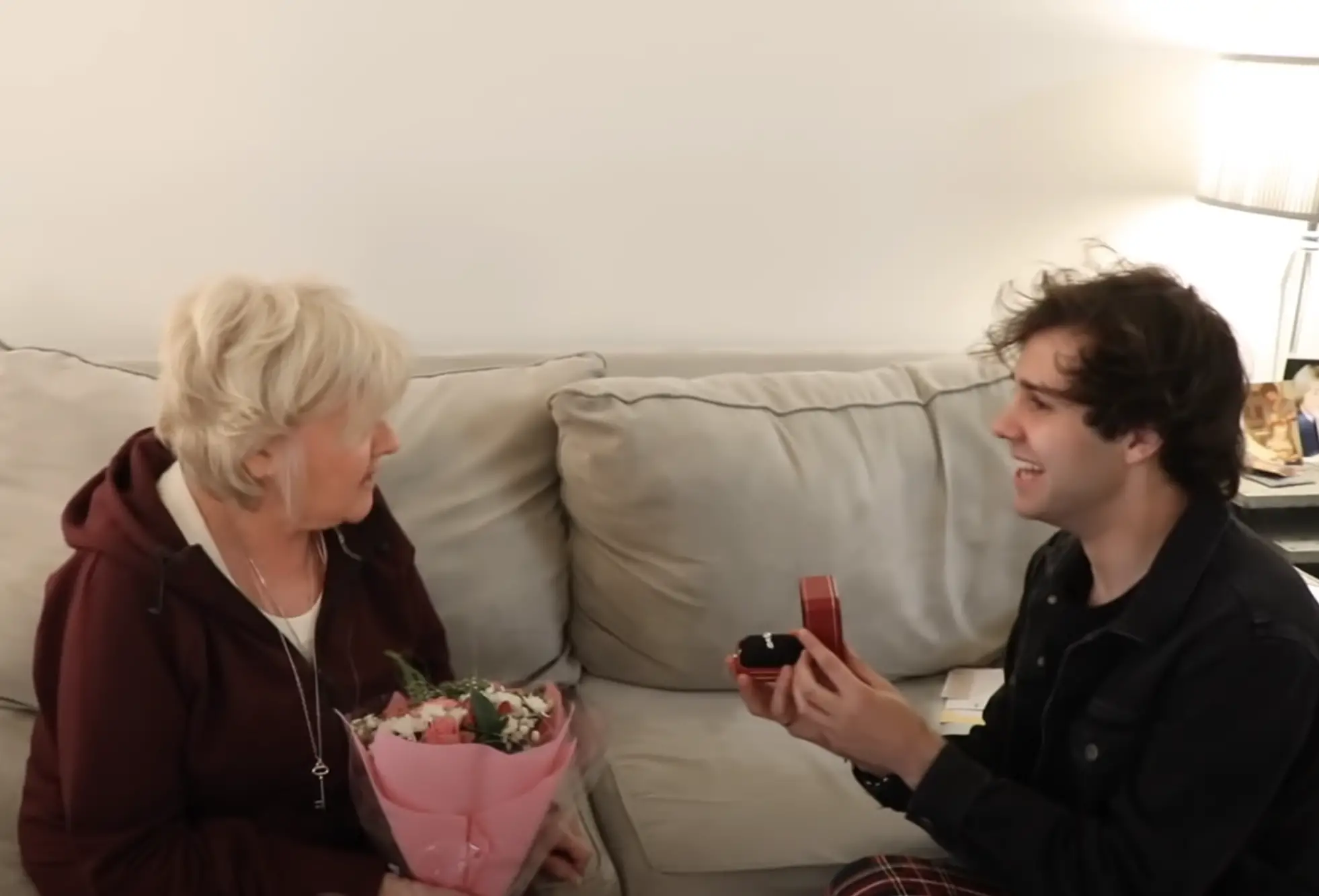 Lorraine Charlotte Nash surprised with a proposal by David Dobrik at her Boston home in a clip added to YouTube on May 18, 2019 | Source: YouTube/David Dobrik
