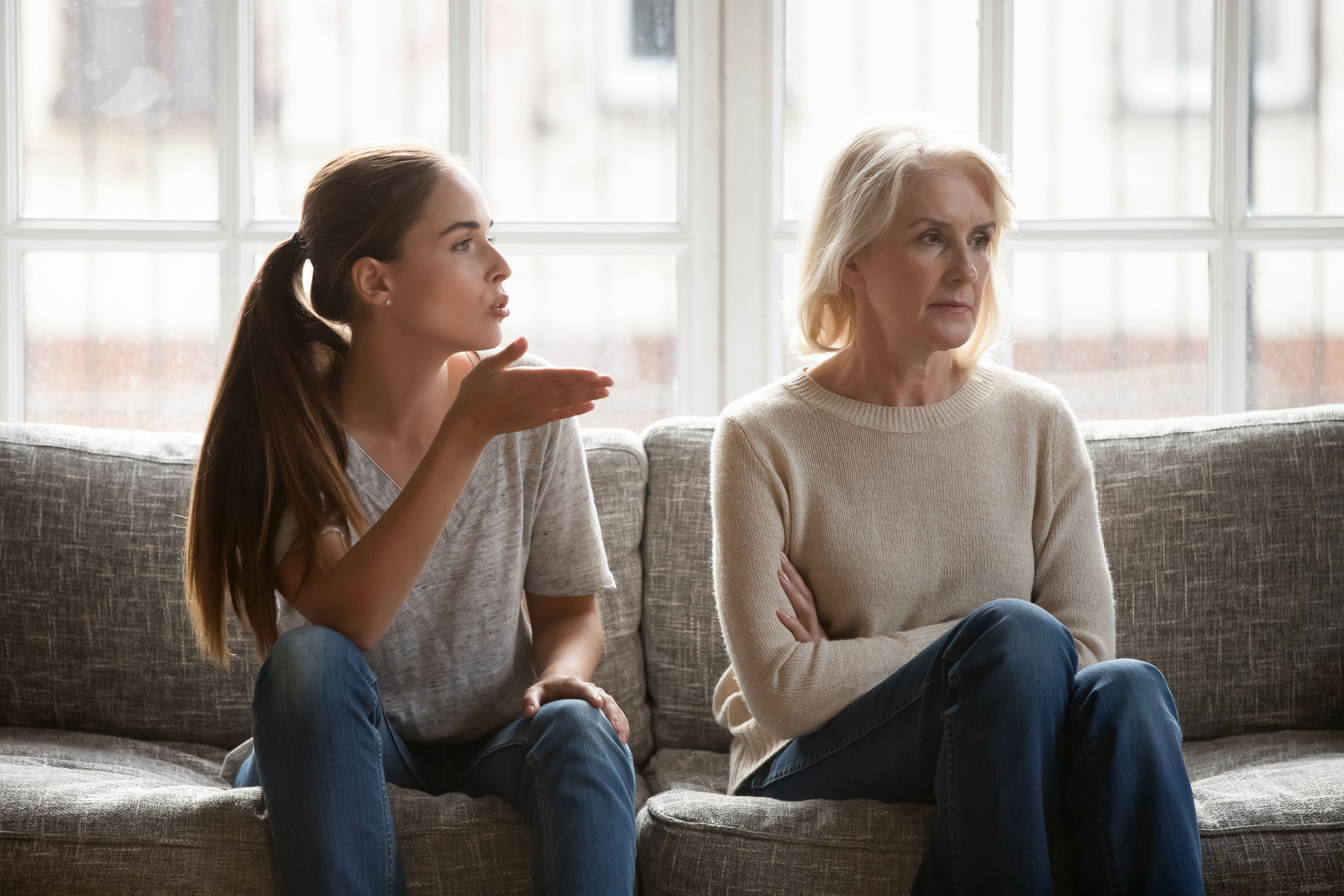 Grown-up daughter complaining to her mother | Source: Shutterstock