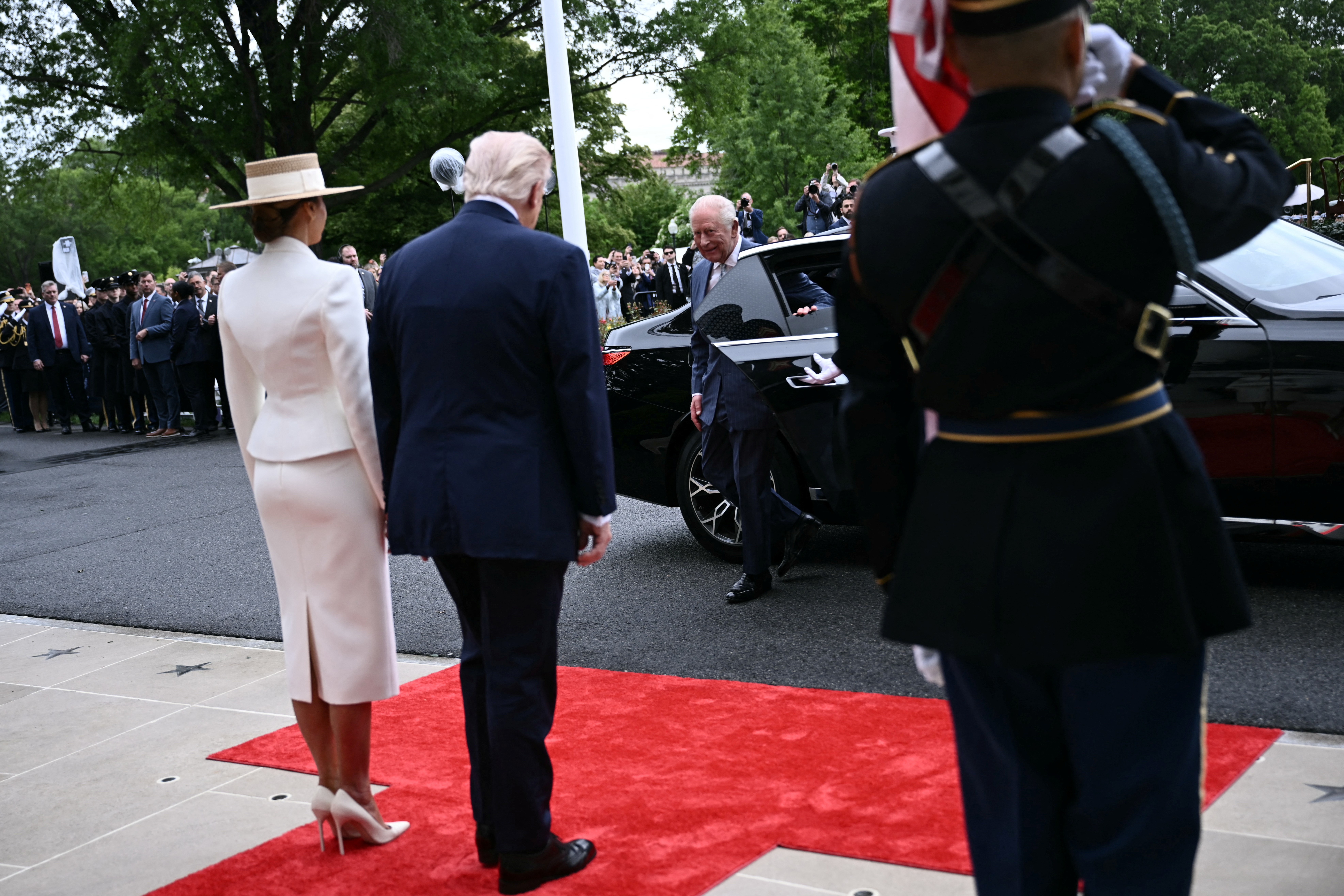 Donald Trump and Melania Trump greet King Charles III and Queen Camilla at an arrival ceremony on the White House South Lawn, April 28, 2026. | Source: Getty Images
