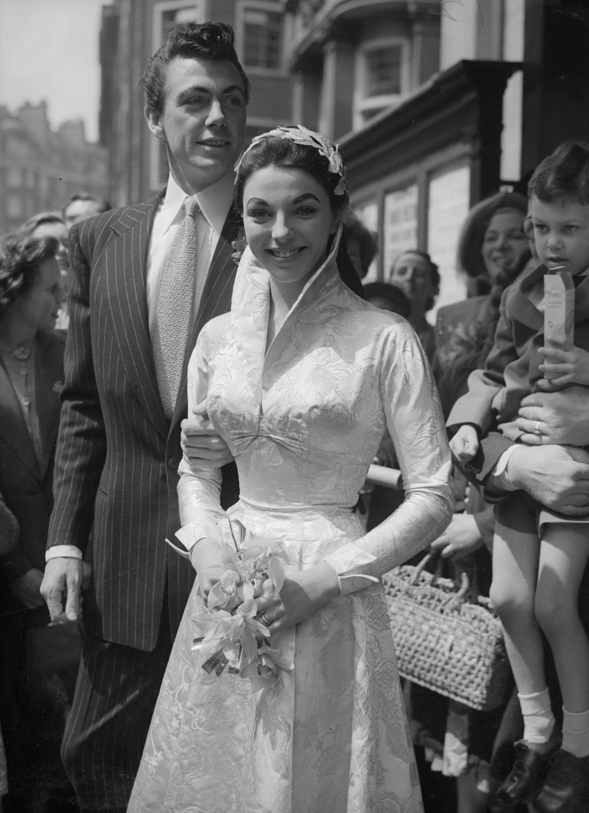 A radiant Joan Collins with her first husband shortly after exchanging vows. Though they began with high hopes, the actress has openly spoken about the challenges she faced in this troubled marriage. | Source: Getty Images