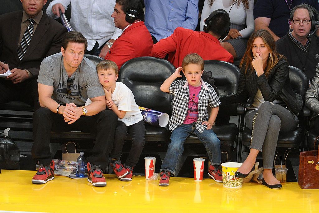 Mark Walberg with his sons and wife Rhea Durham watch the New York Knicks play the Los Angeles Lakers in 2014 in Los Angeles | Source: Getty Images 
