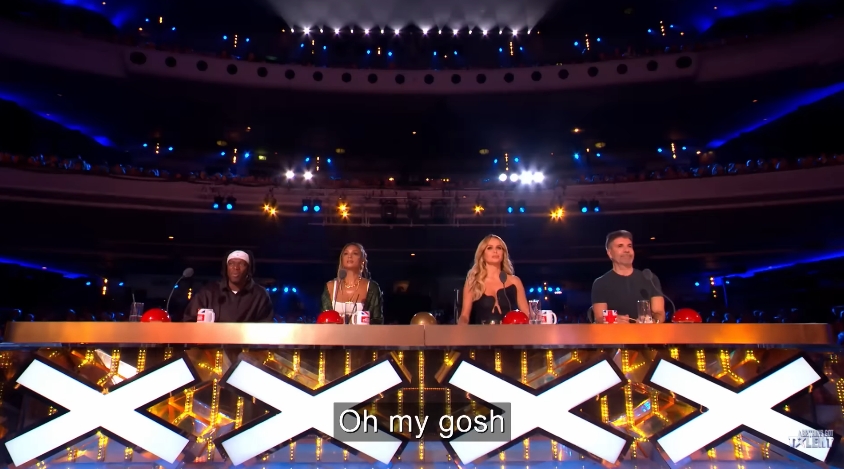 Judges look on intently as the performance unfolds, weighing in on the act's impact. | Source: YouTube/Britain's Got Talent