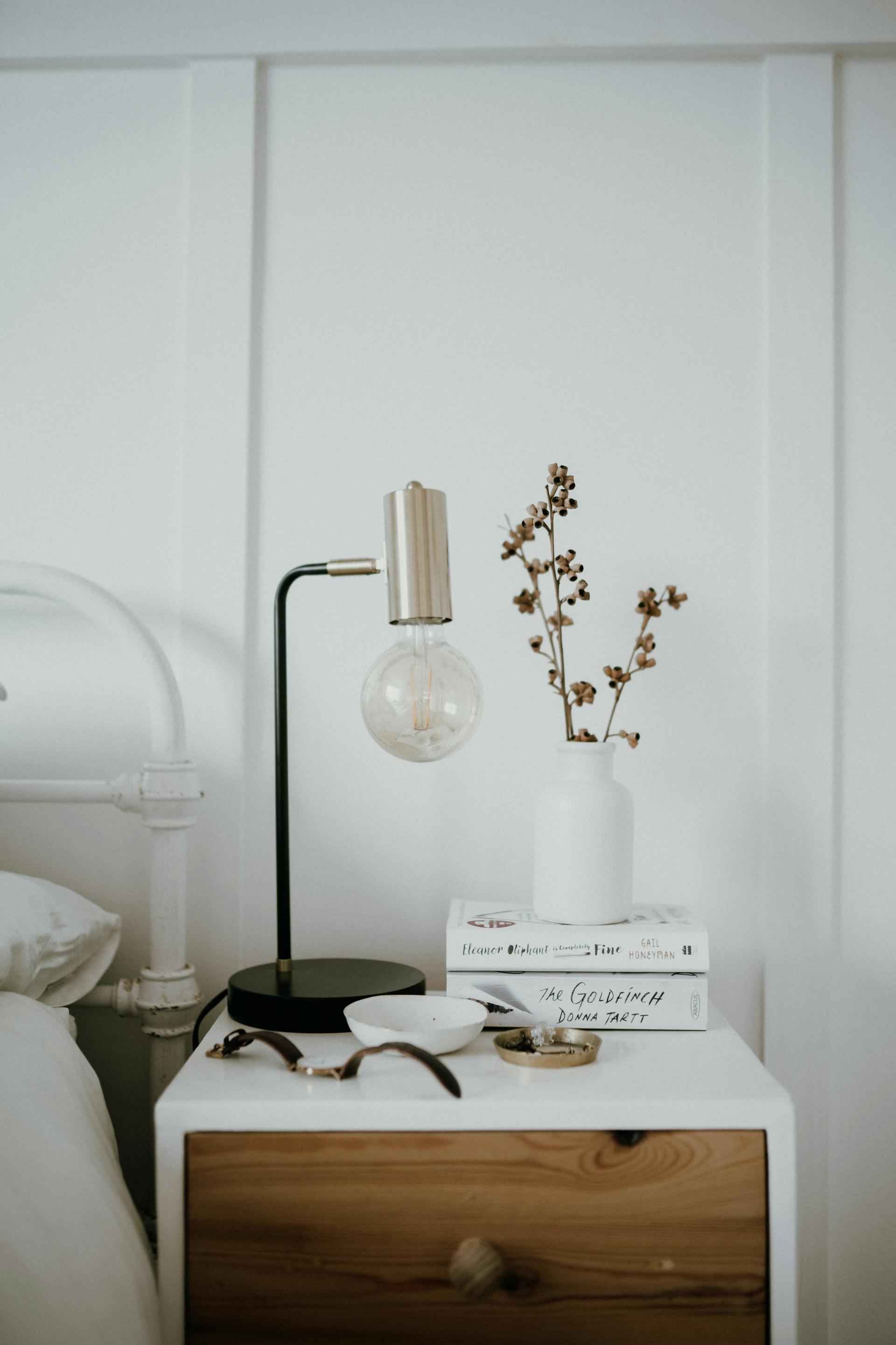 A white ceramic vase on a bedside table | Source: Pexels