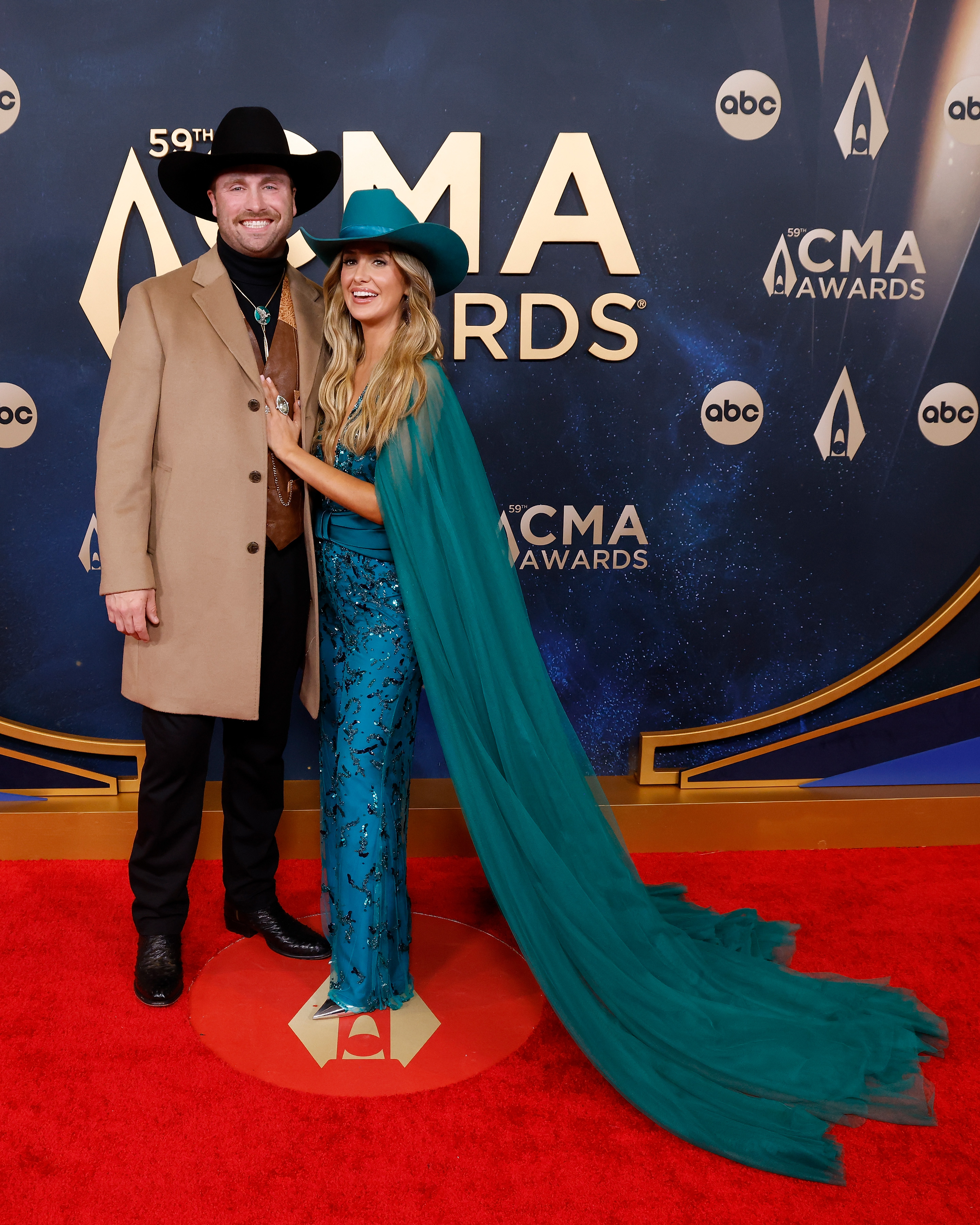 Devlin Hodges and Lainey Wilson at Music City Center on November 19, 2025 in Nashville, Tennessee | Source: Getty Images