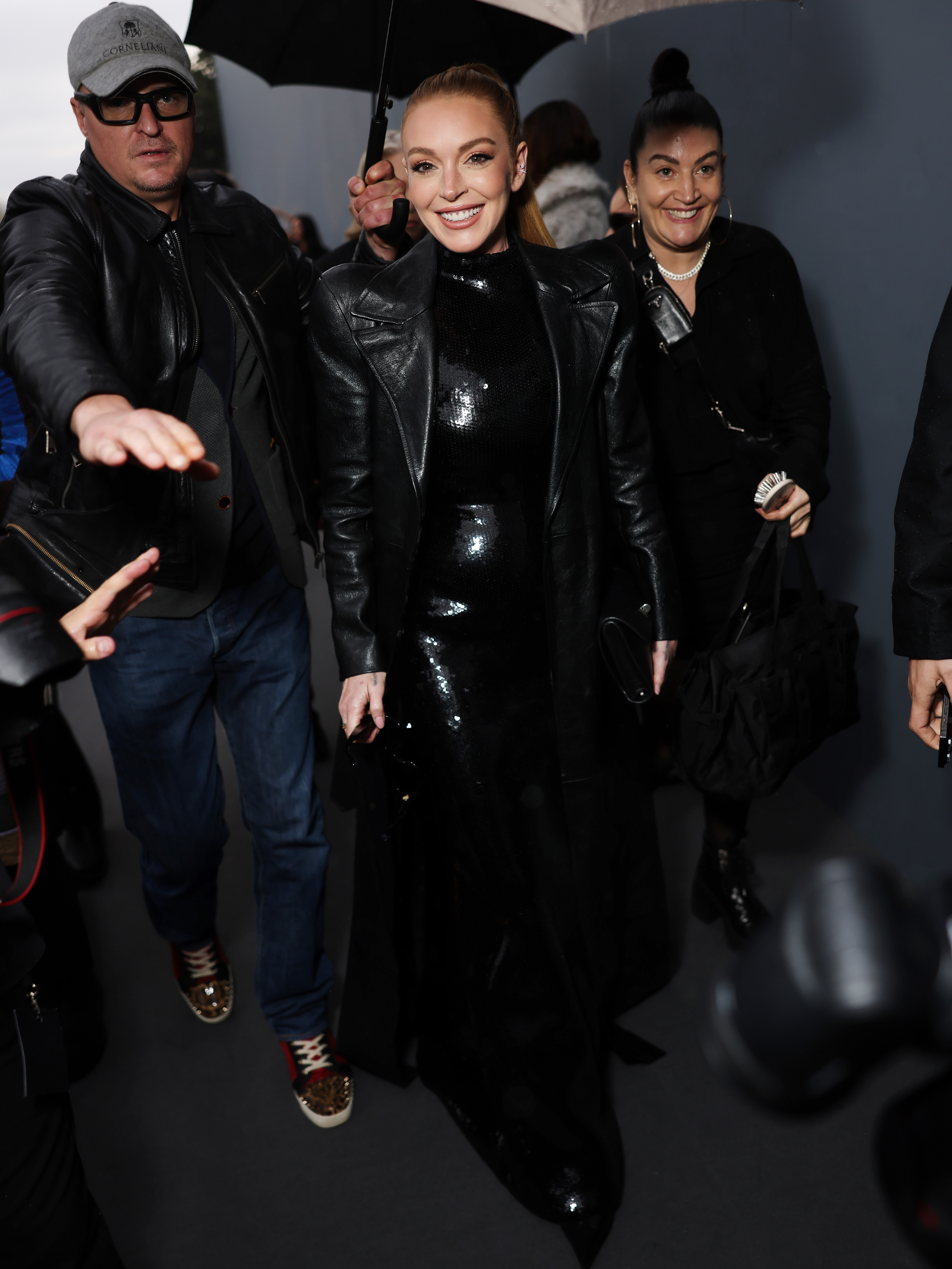 Lindsay Lohan smiles while attending Paris Fashion Week in France on September 30, 2024 | Source: Getty Images