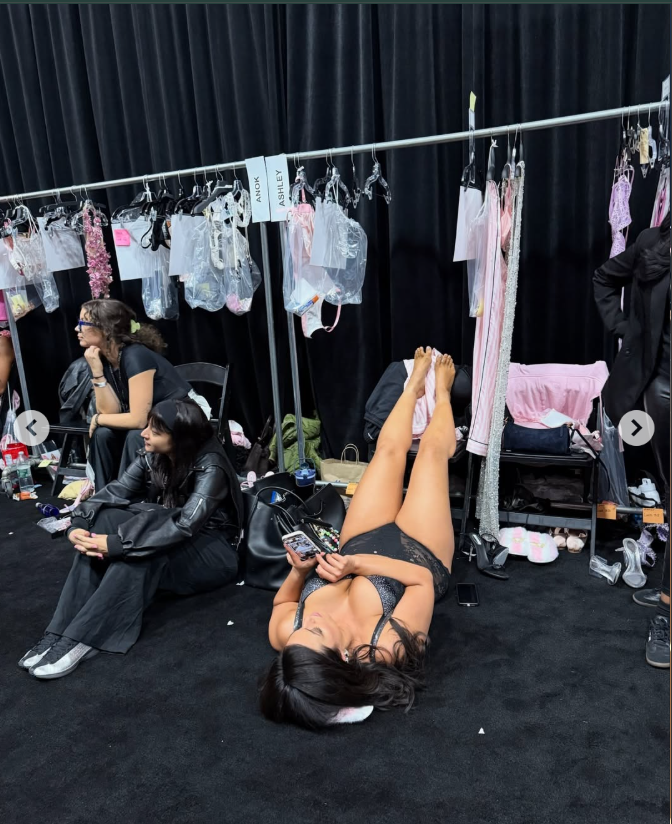 Ashley Graham relaxes backstage during the 2025 Victoria's Secret Fashion Show | Source: Instagram/ashleygraham