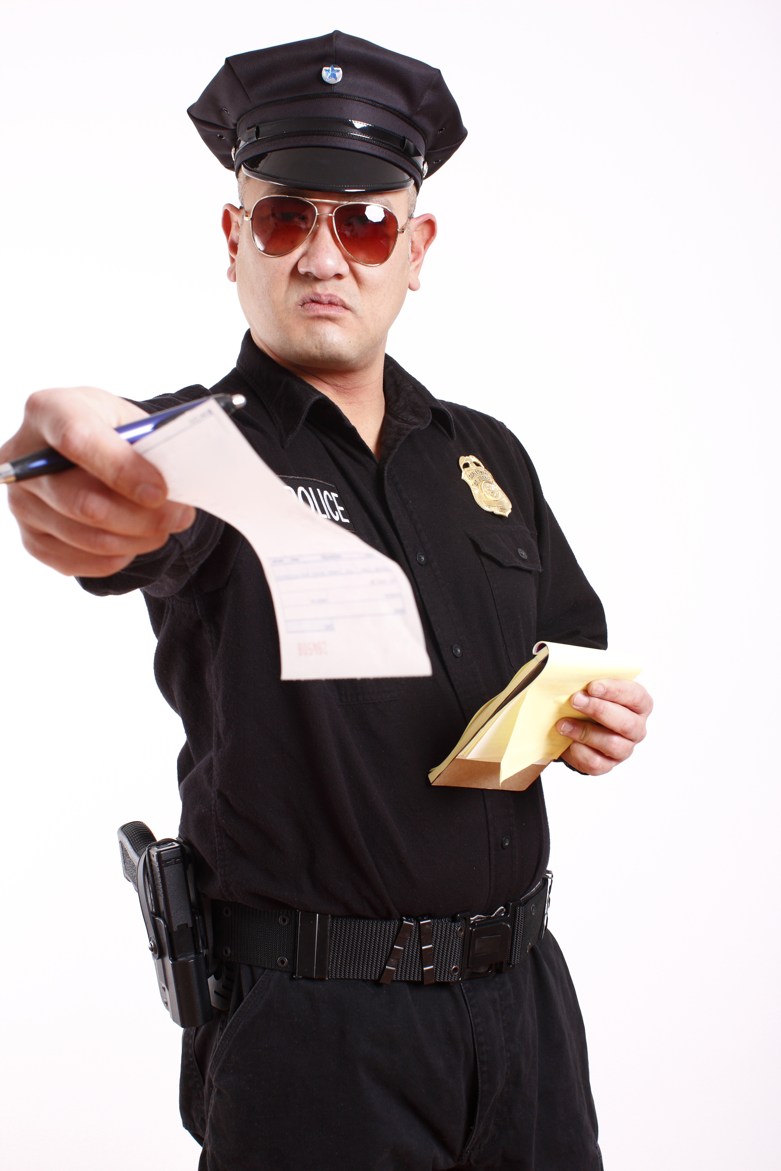 A police officer with a ticket. | Source: Shutterstock