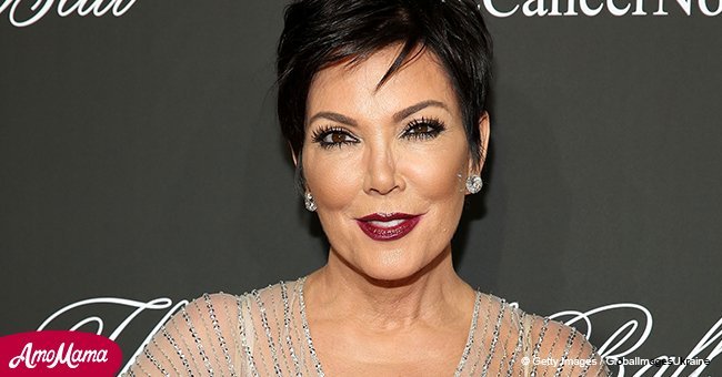 Kris Jenner exposes her legs in a short black gown