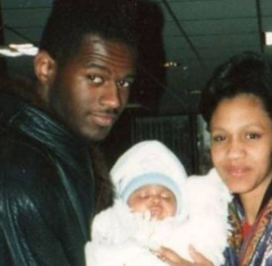 An old picture of Brian and Julie McKnight holding their son Clyde, from a post dated September 22, 2021. | Source: Instagram/clydemcknight