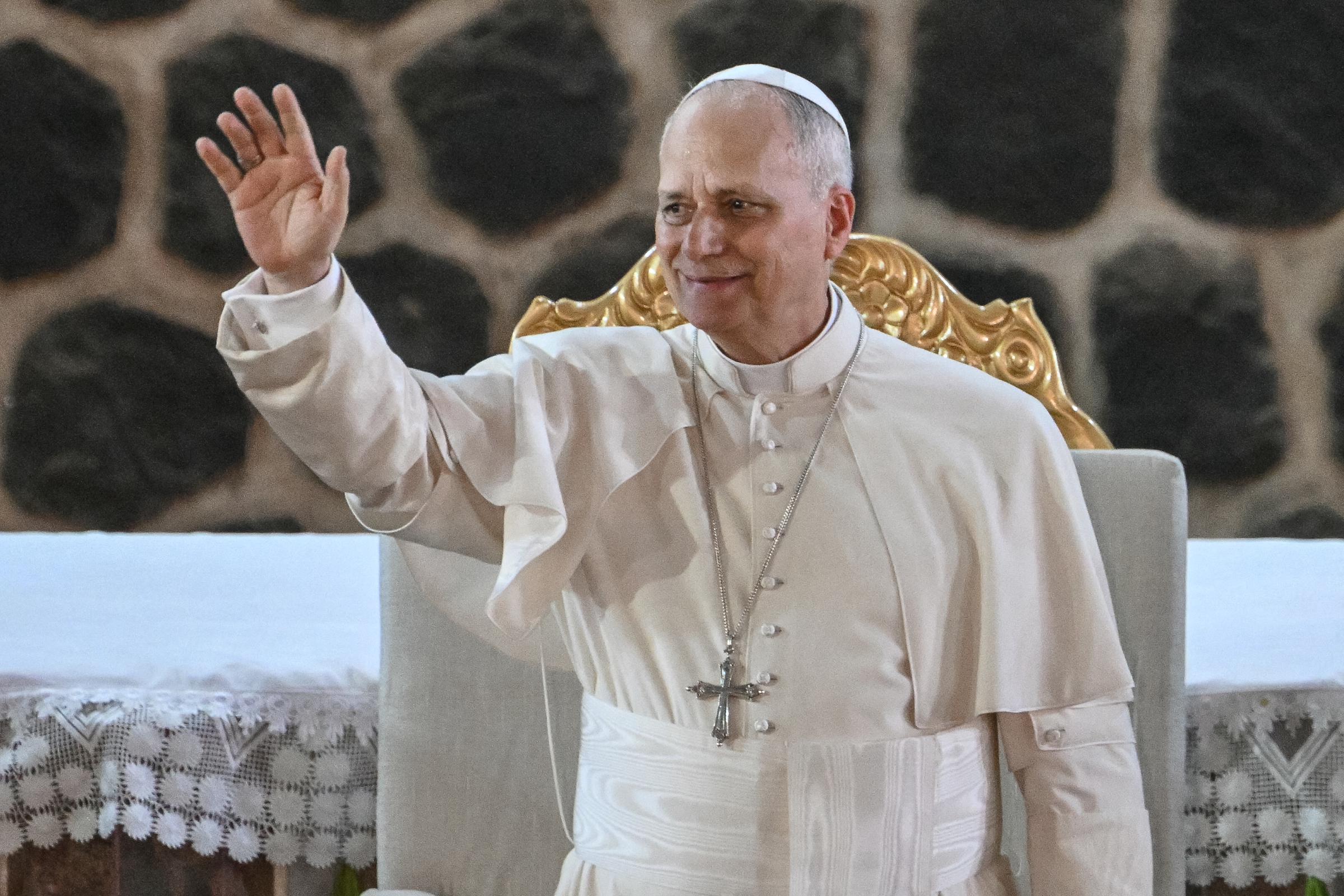 Pope Leo XIV waves as he arrives at Saint Joseph's Cathedral in Bamenda, on the fourth day of an 11-day apostolic journey to Africa, on April 16, 2026 | Source: Getty Images