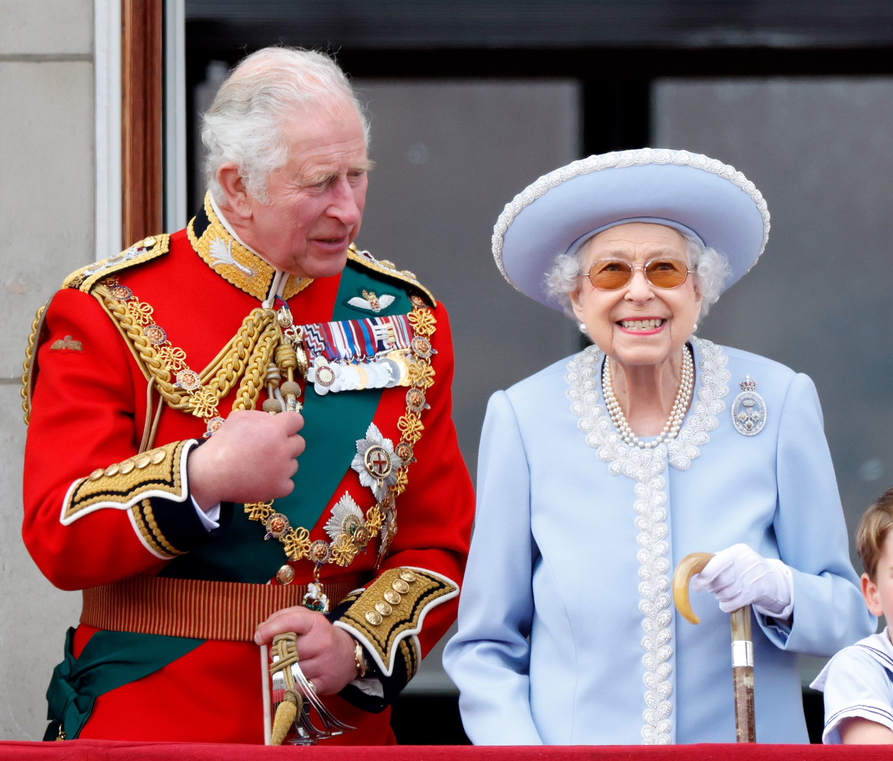 Prince (now King) Charles, and Queen Elizabeth II watch a flypast from the balcony of Buckingham Palace during Trooping the Colour on June 2, 2022 in London, England. | Source: Getty Images