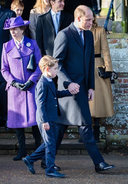 Prince William, Duke of Cambridge and Prince George of Cambridge attends the Christmas Day Church service at Church of St Mary Magdalene on the Sandringham estate | Photo: Getty Images