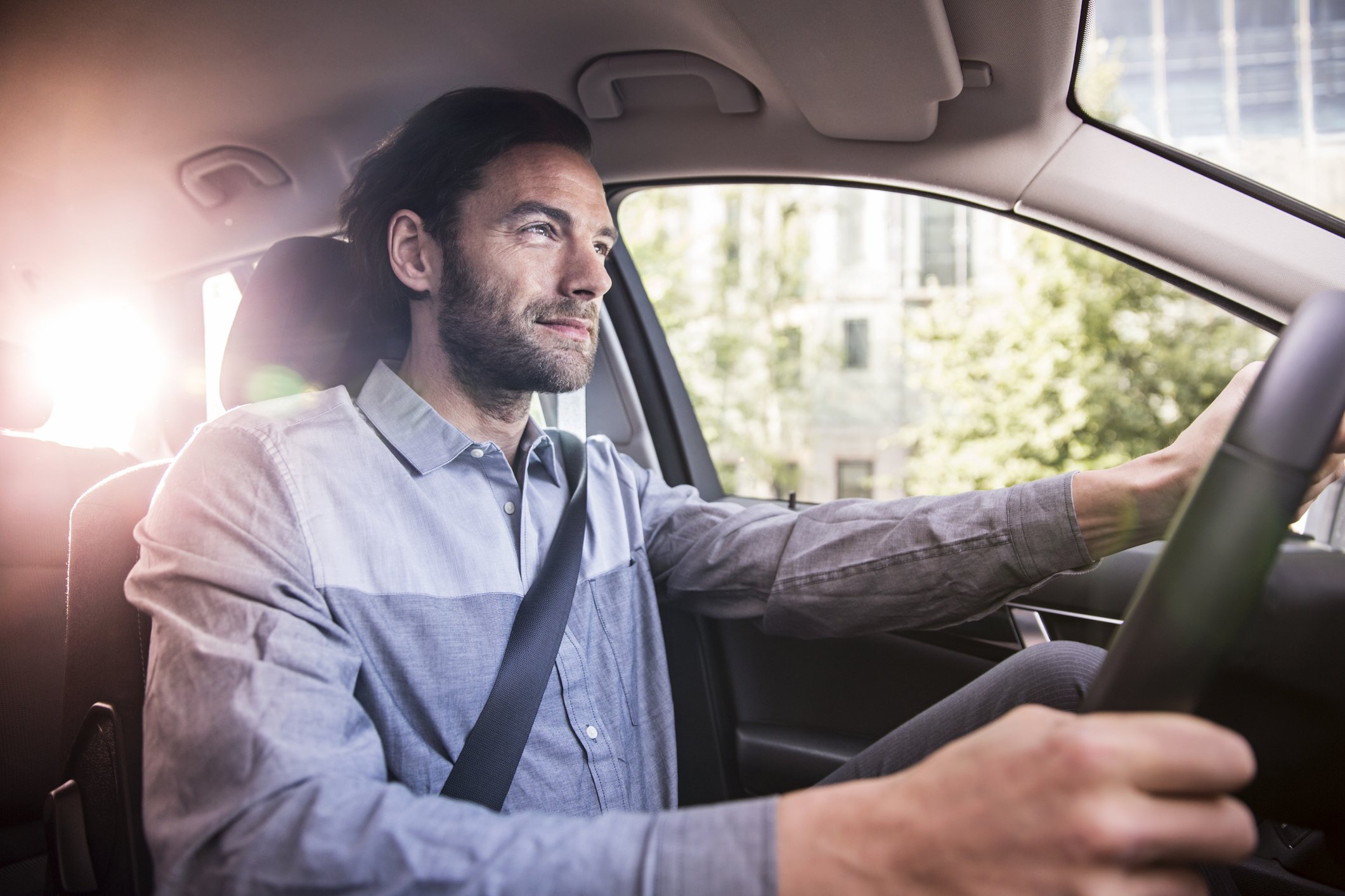 A man driving his car. | Photo: Getty Images