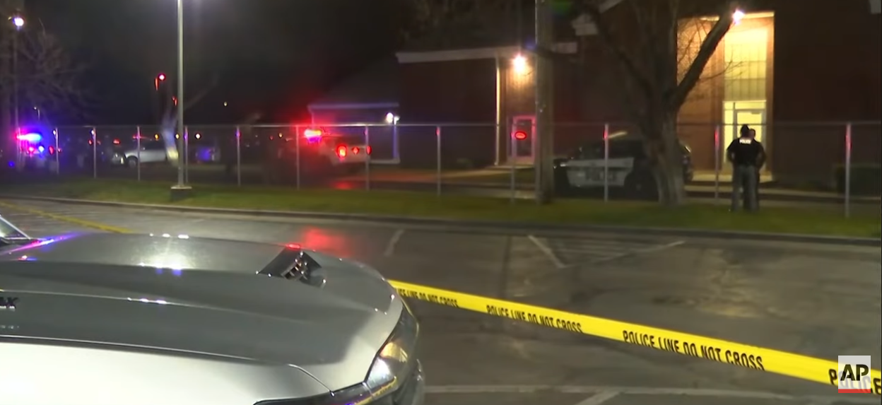 Police secure the scene outside a Latter-day Saint church in Salt Lake City following a deadly shooting during a memorial service | Source: YouTube/Associated Press
