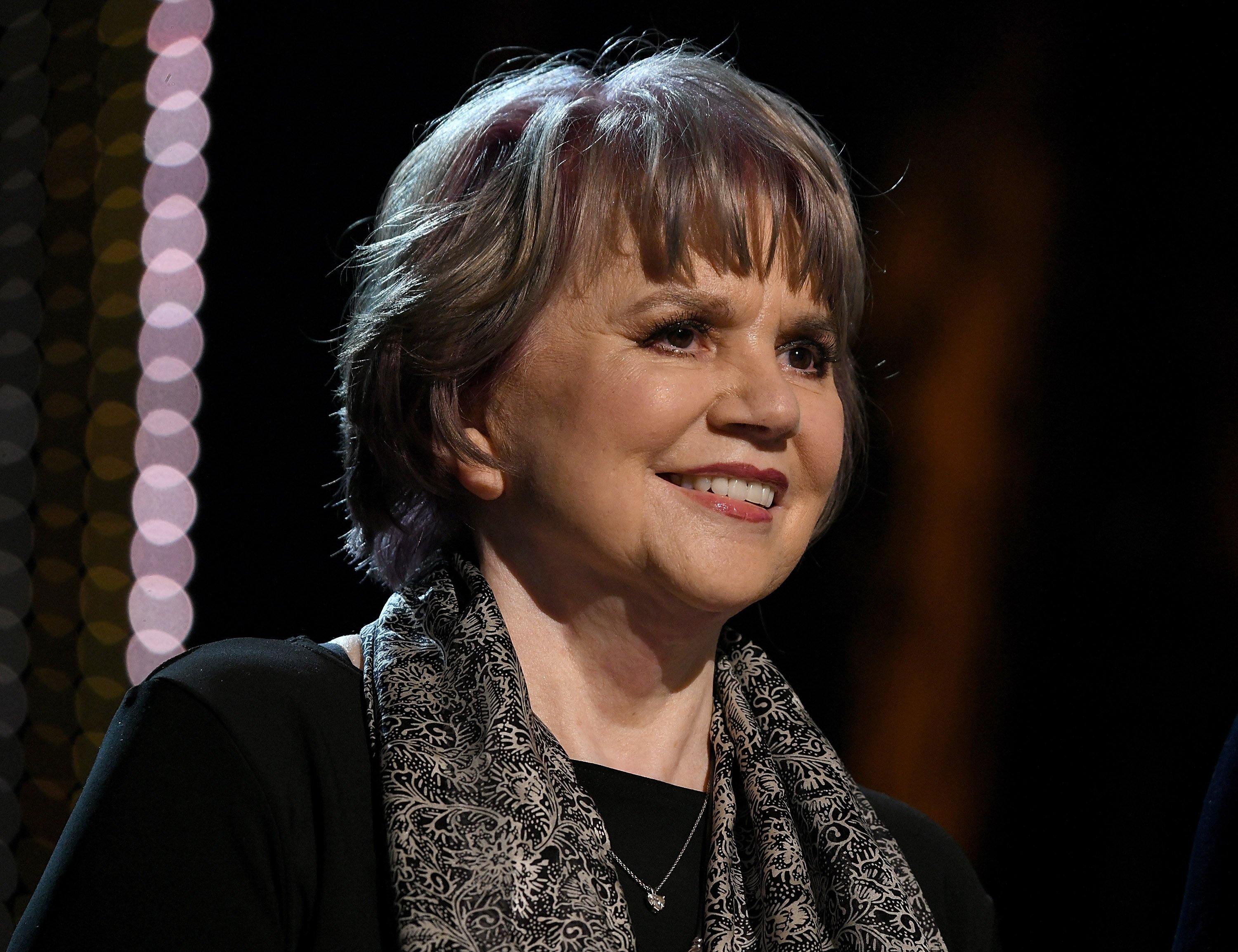 Linda Ronstadt speaks at the MusiCares Person of the Year honoring Dolly Parton at Los Angeles Convention Center on February 8, 2019 in Los Angeles, California.┃Source: Getty Images
