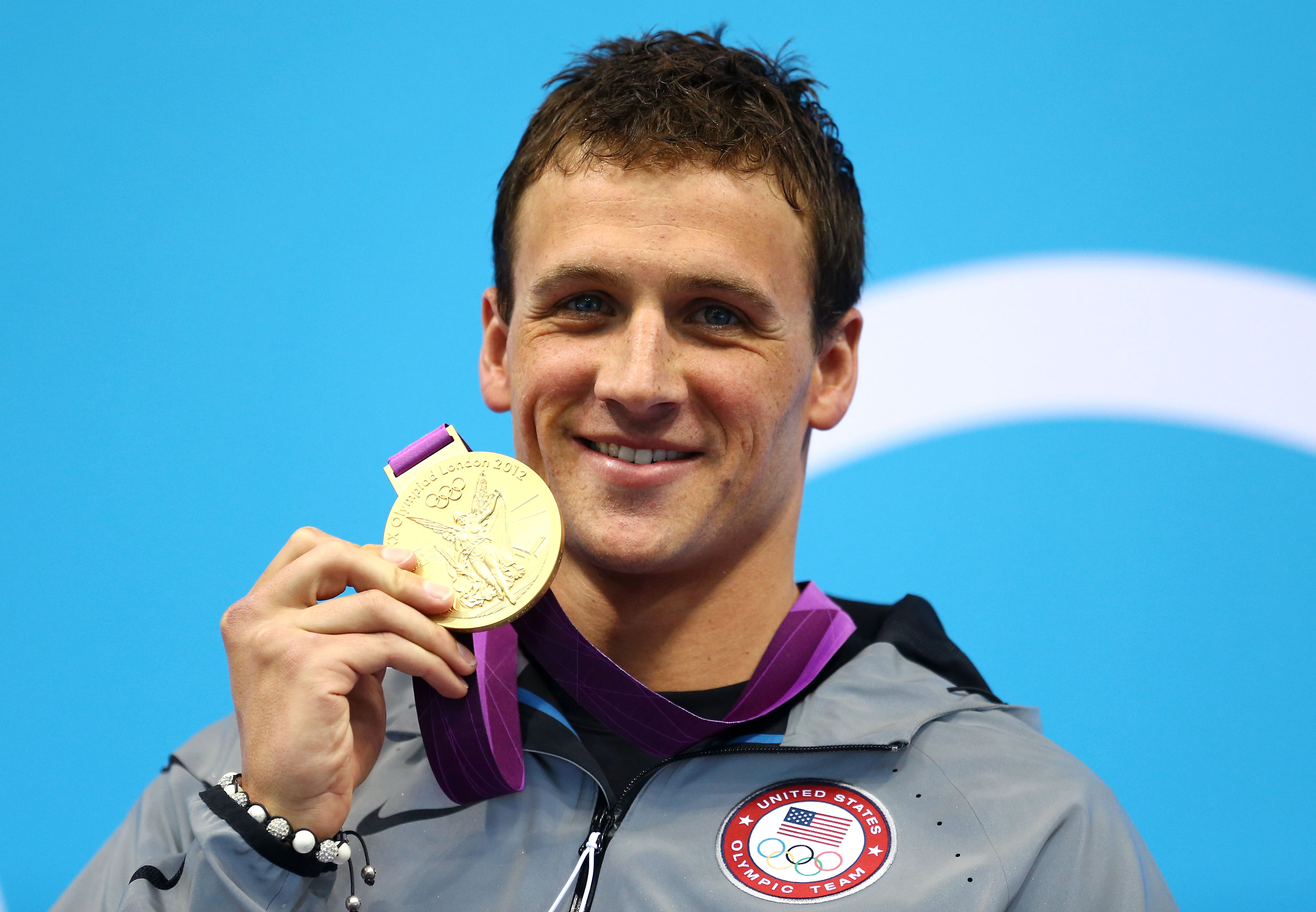 Ryan Lochte celebrates with his Gold Medal during the Medal Ceremony for the Men's 400m Individual Medley at the London 2012 Olympic Games in London, England, on July 28, 2012. | Source: Getty Images