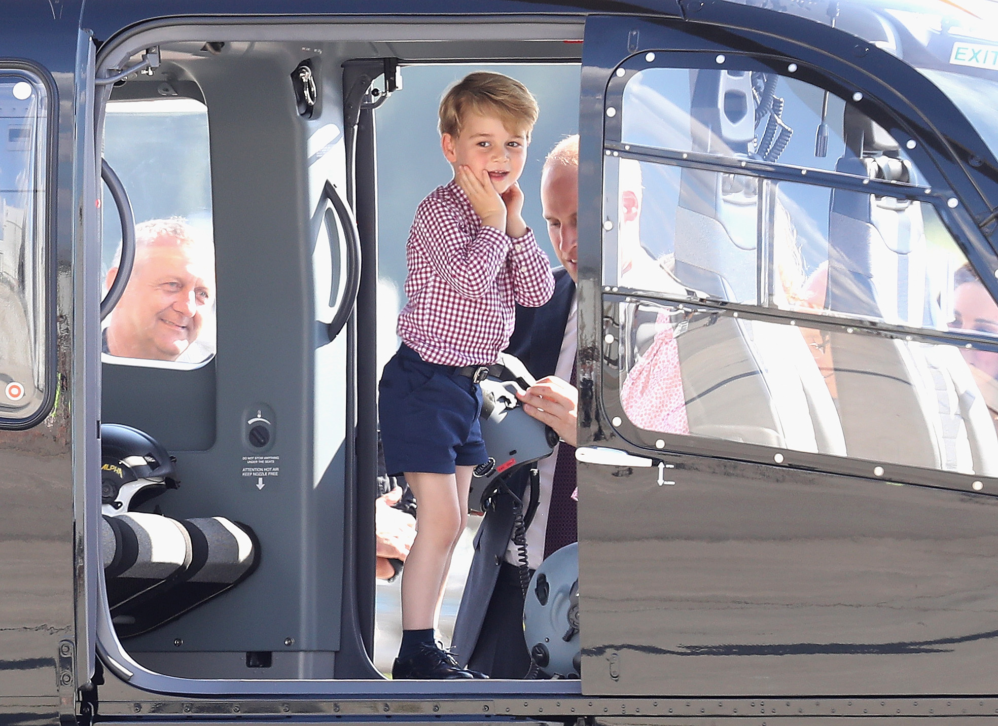 Prince William, Princess Catherine, Prince George, and Princess Charlotte view helicopter models H145 and H135 before departing from Hamburg airport on the last day of their official visit to Poland and Germany on 21 July 2017 in Hamburg, Germany. | Source: Getty Images