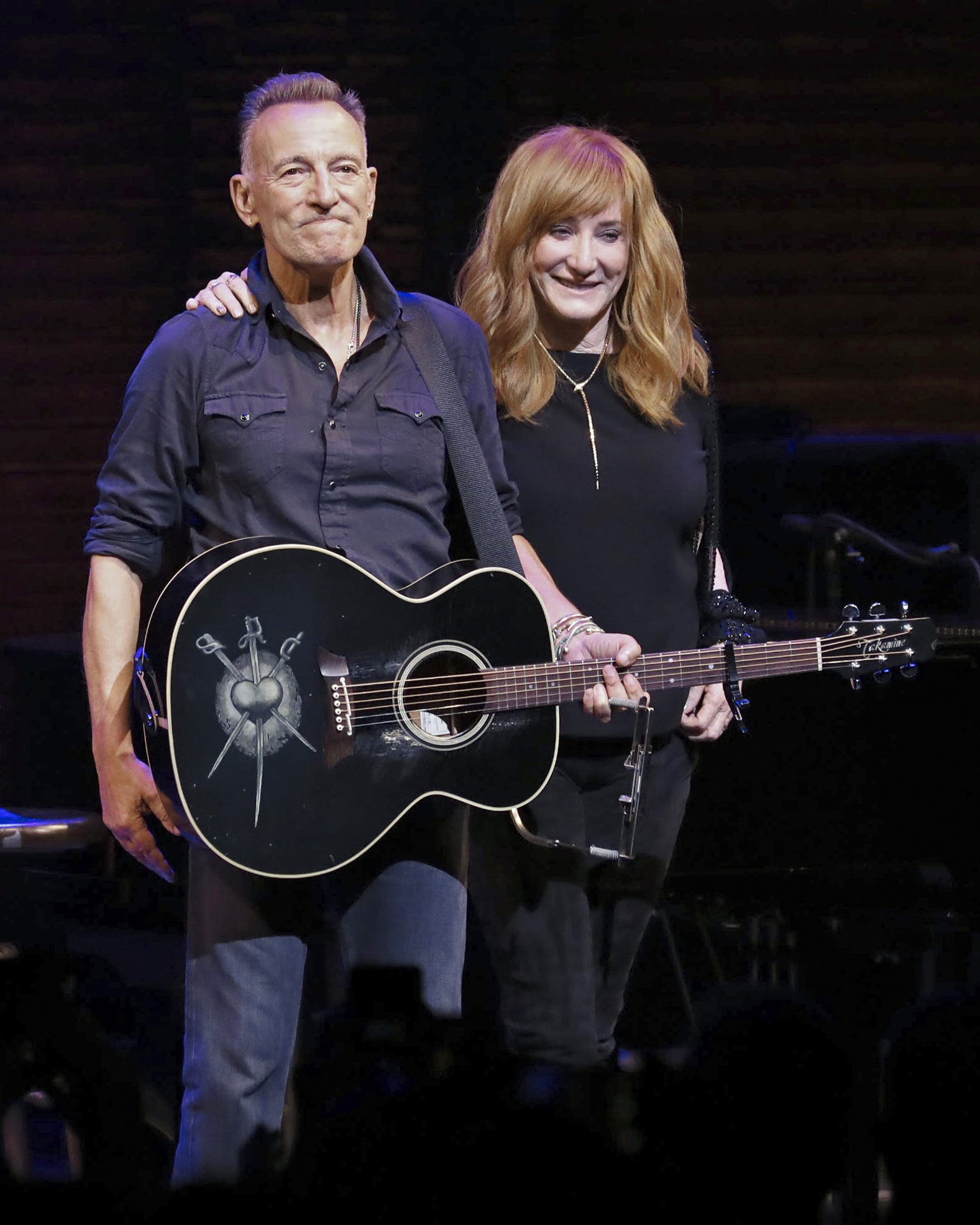 Bruce Springsteen and Patti Scialfa take a bow during the reopening night of 